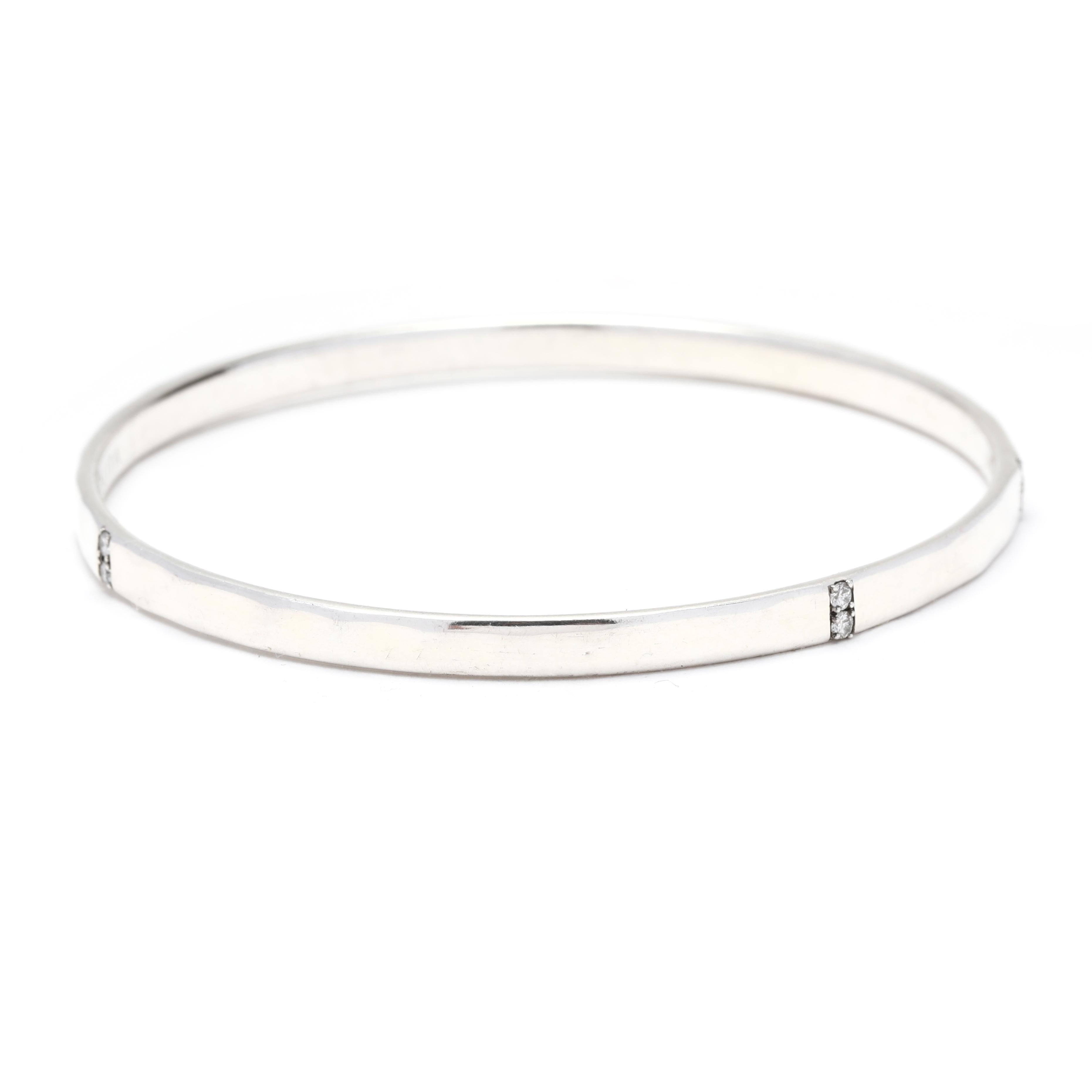 This stunning Ippolita Stardust bangle bracelet is crafted from high-quality sterling silver and adorned with .20ctw of dazzling diamonds. With a length of 7 5/8 inches, this bracelet is the perfect accessory to add a touch of sophistication and