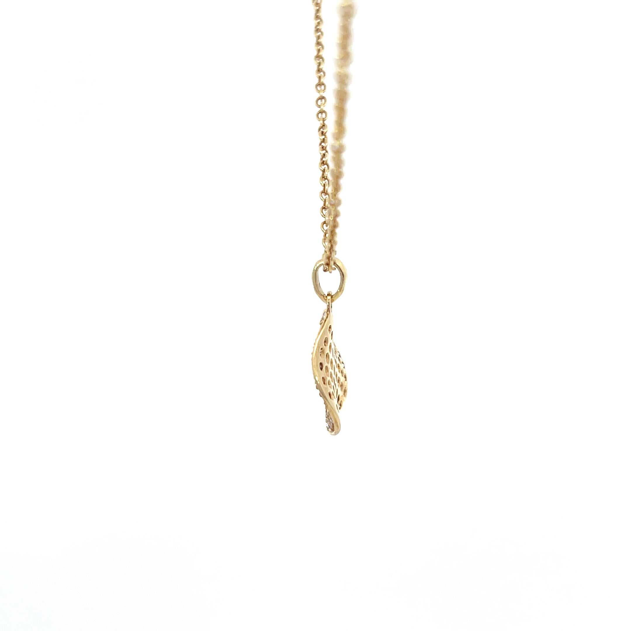 Pendentif en or jaune 18 carats de la collection Stardust d'Ippolita, orné de diamants. Le pendentif comporte environ 0,25ctw de diamants ronds brillants, sur une chaîne à maillons ajustable de 16-18