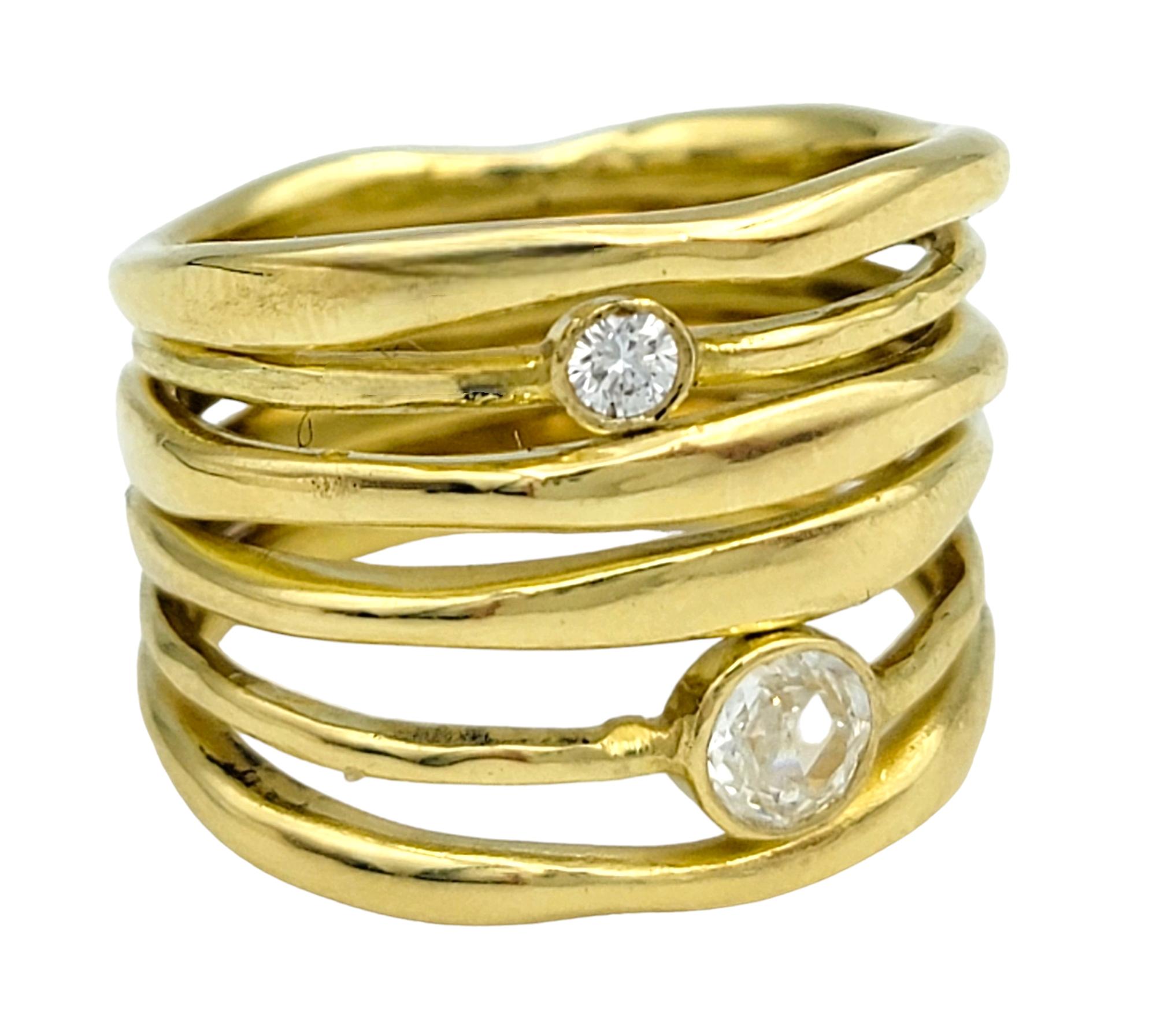 Ring Size: 5

Discover the allure of timeless glamour with the 'Movie Star' 6-Band Ring from Ippolita's Stardust Collection. Crafted in radiant 18 karat yellow gold, this exquisite piece features six intertwined bands, adorned with two shimmering