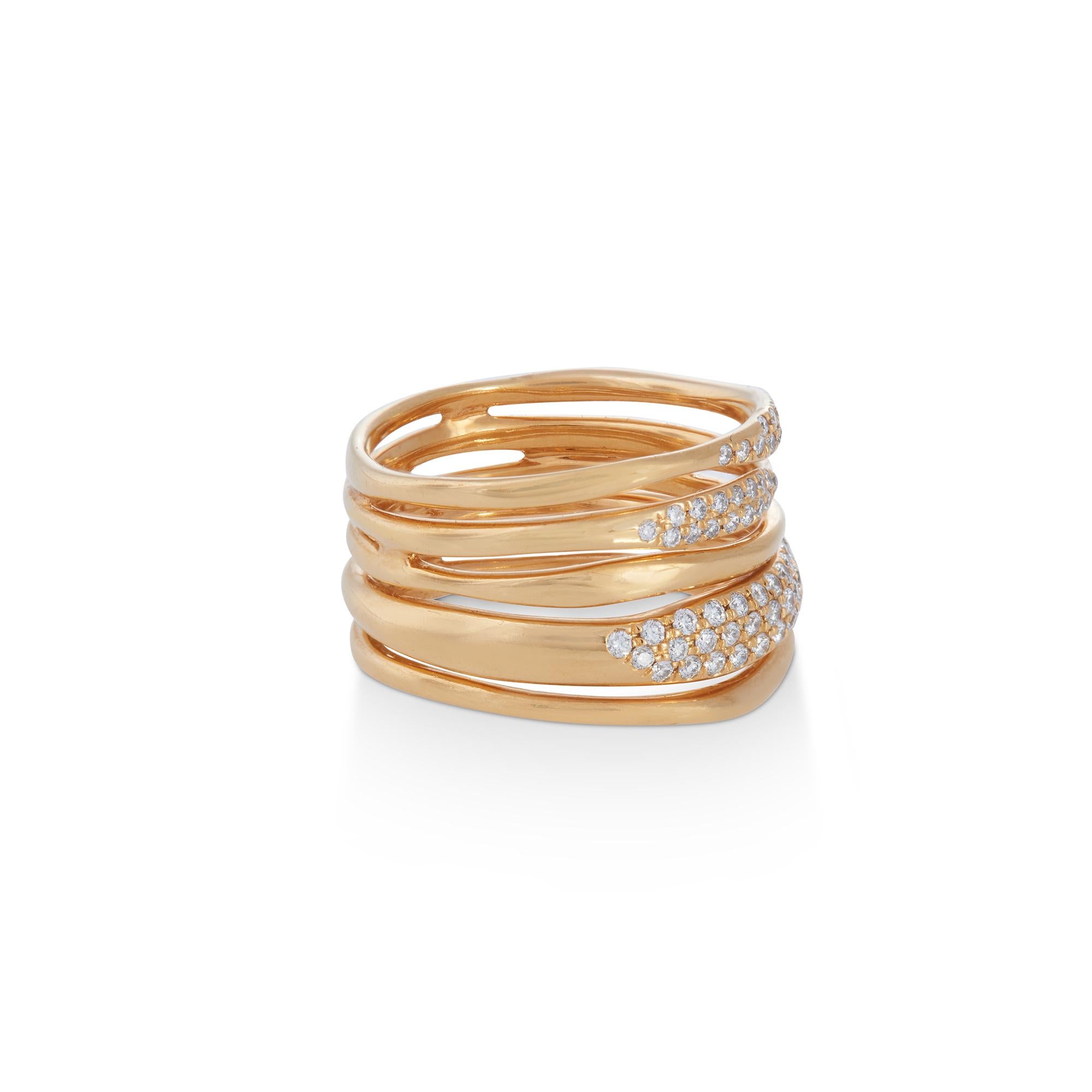 Authentic Ippolita 'Squiggle' ring from the Stardust collection crafted in 18 karat yellow gold.  The ring features five stacked bands, three of which are set with round brilliant diamonds for an estimated .33 carats total weight.  Size 6.  Signed