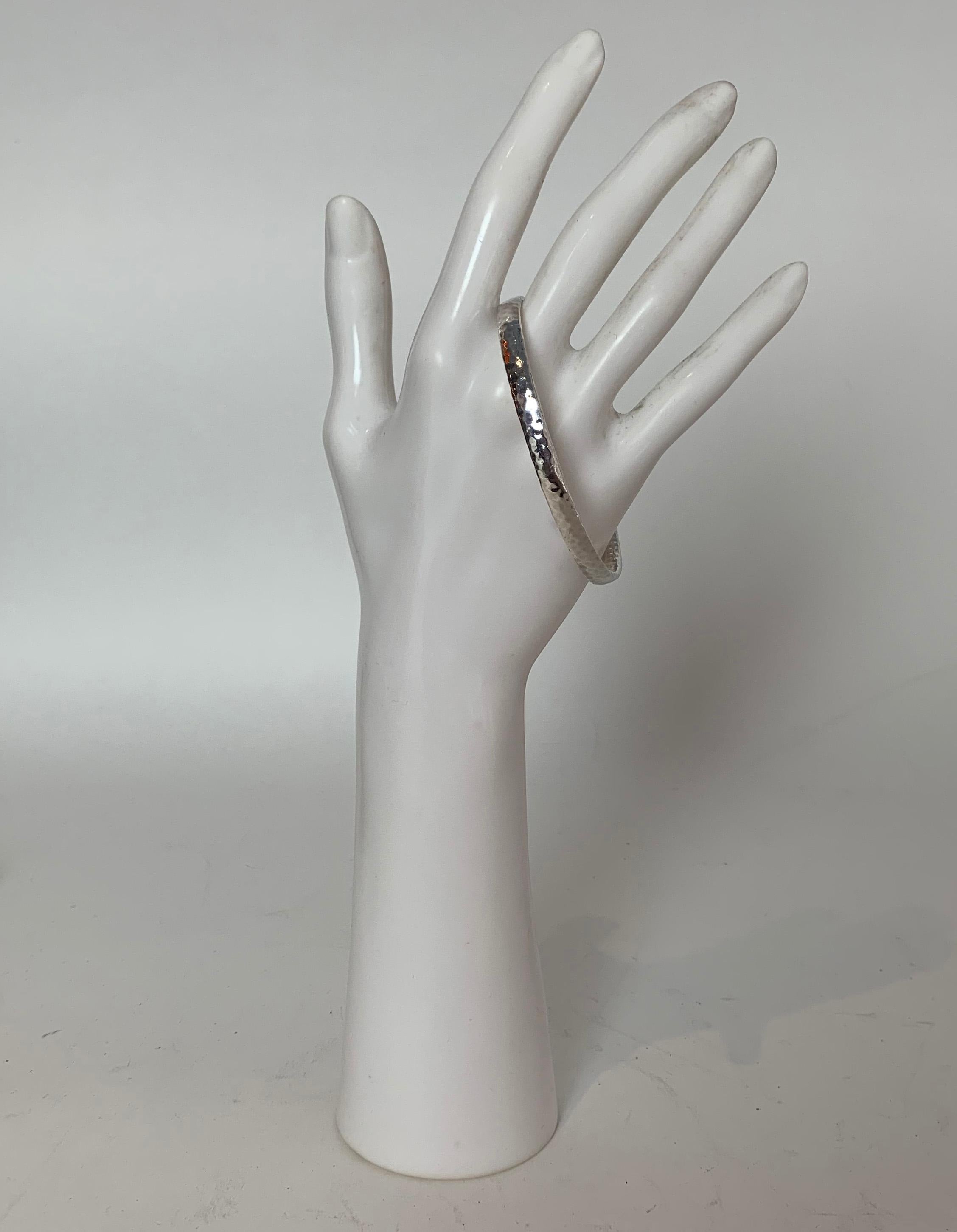 Ippolita Sterling Silver Classico Hammered Flat Bangle Bracelet

Materials: Sterling silver
Hallmarks: IPPOLITA FATTO A MANO
Closure/Opening: Slip on
Overall Condition: Excellent
Estimated Retail: $295 plus tax

Measurements: Ippolita size