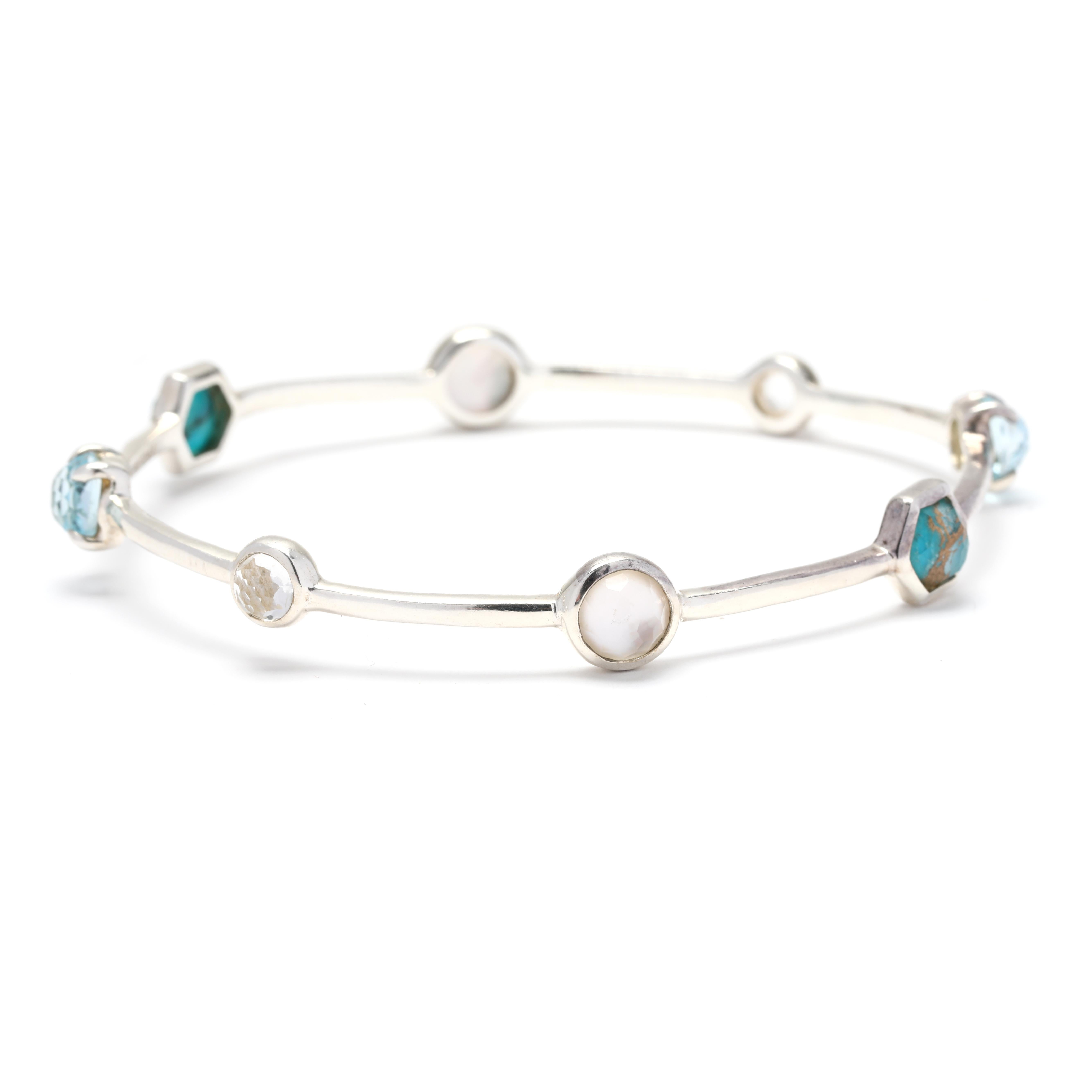 This Ippolita Rock Candy Turquoise Blue Topaz Bangle Bracelet is a stunning piece of jewelry that will add a pop of color to any outfit. Made from high-quality sterling silver, this bracelet features a beautiful combination of turquoise and blue