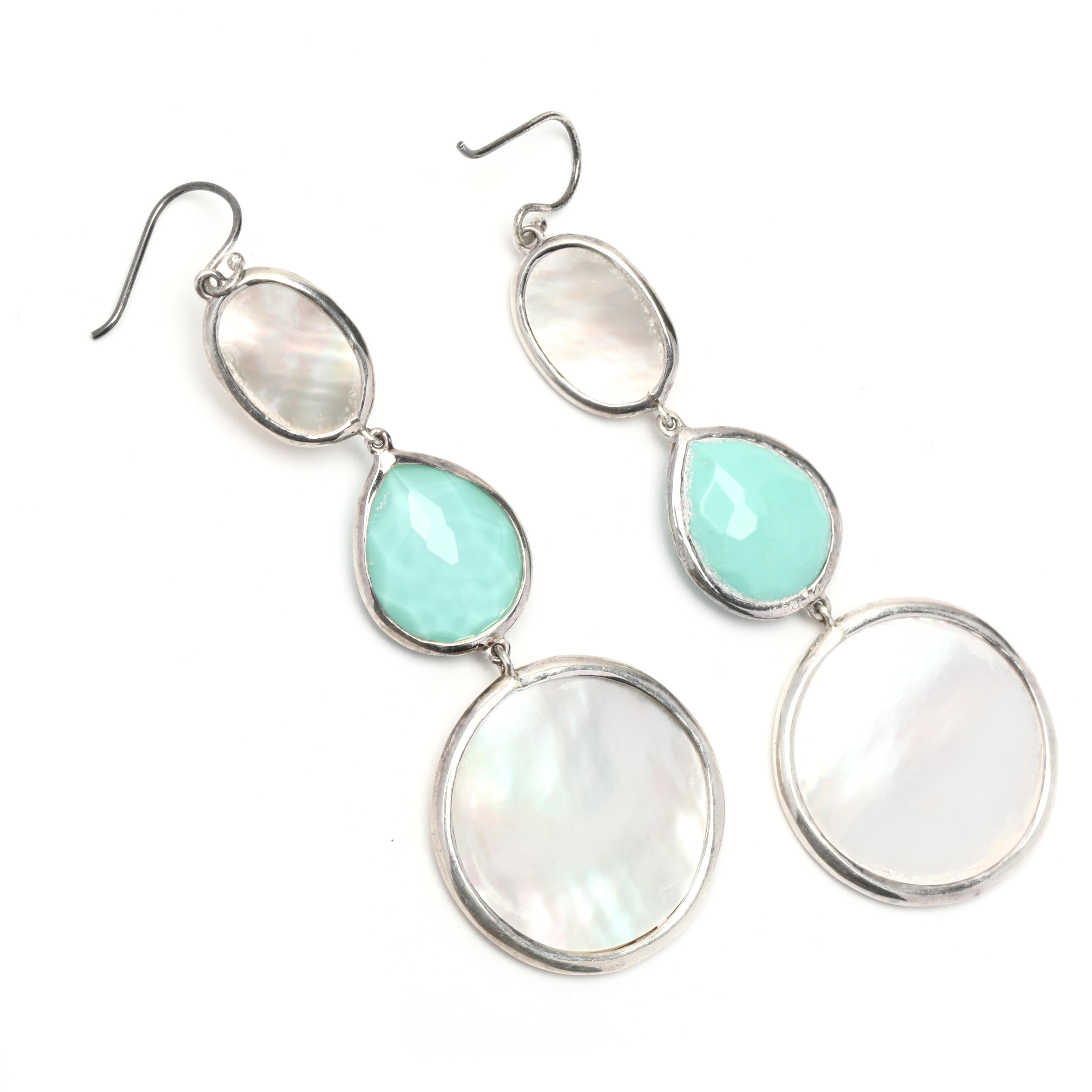 These stunning Ippolita Turquoise Mother of Pearl 3 Drop Slice Dangle Earrings are the perfect addition to any jewelry collection. Made from sterling silver, these earrings feature three vibrant and unique slices of turquoise mother of pearl. The