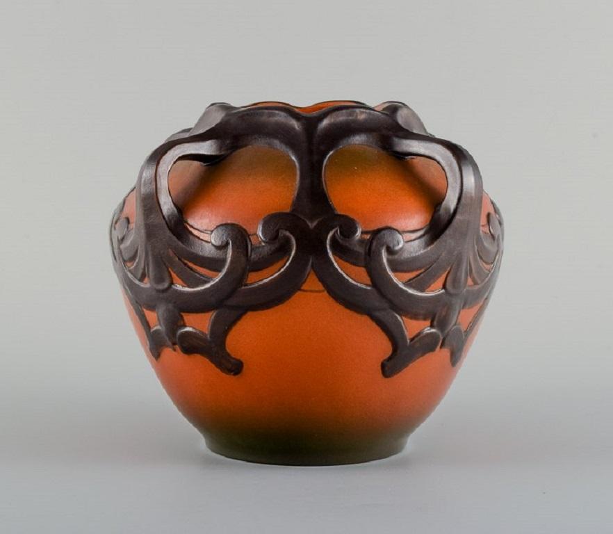 Ipsens, Denmark. Art Nouveau vase in hand-painted glazed ceramics. 1920s. 
Model number 710.
Measures: 21,0 x 16.5 cm.
In excellent condition.
Marked.