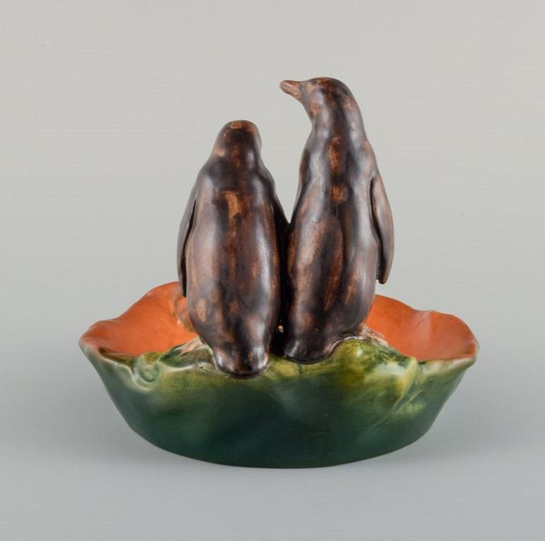 Early 20th Century Ipsens, Denmark, Bowl in Hand-Painted Glazed Ceramics with Penguins