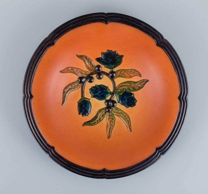Danish Ipsens, Denmark, Ceramic Bowl with Floral Motif. Glaze in Orange-Green Shades For Sale