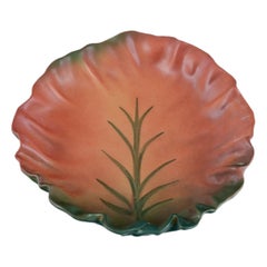 Ipsens, Denmark. Ceramic bowl with wavy rim. Motif of a plant. 1930s