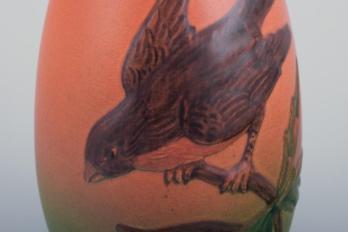Ipsens, Denmark, ceramic vase with a bird motif on a branch. Approx. 1930 In Excellent Condition For Sale In Copenhagen, DK