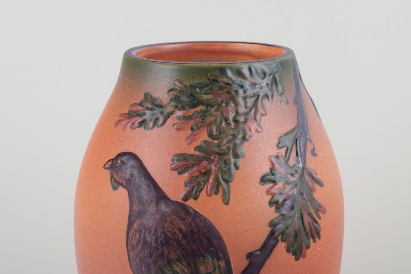 Danish Ipsens, Denmark. Ceramic vase with motif of bird on branch. 1930s For Sale