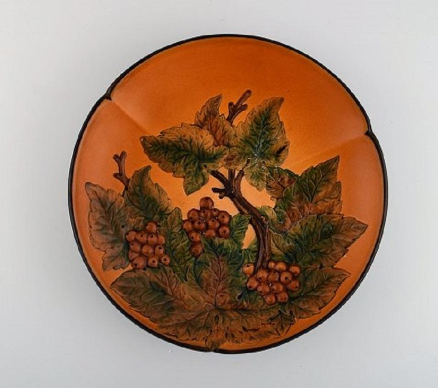 Ipsen's, Denmark. Circular dish with berries and foliage in hand painted glazed ceramics. Model number 118, circa 1920
Measures: 29 x 5 cm.
In excellent condition.
Stamped.