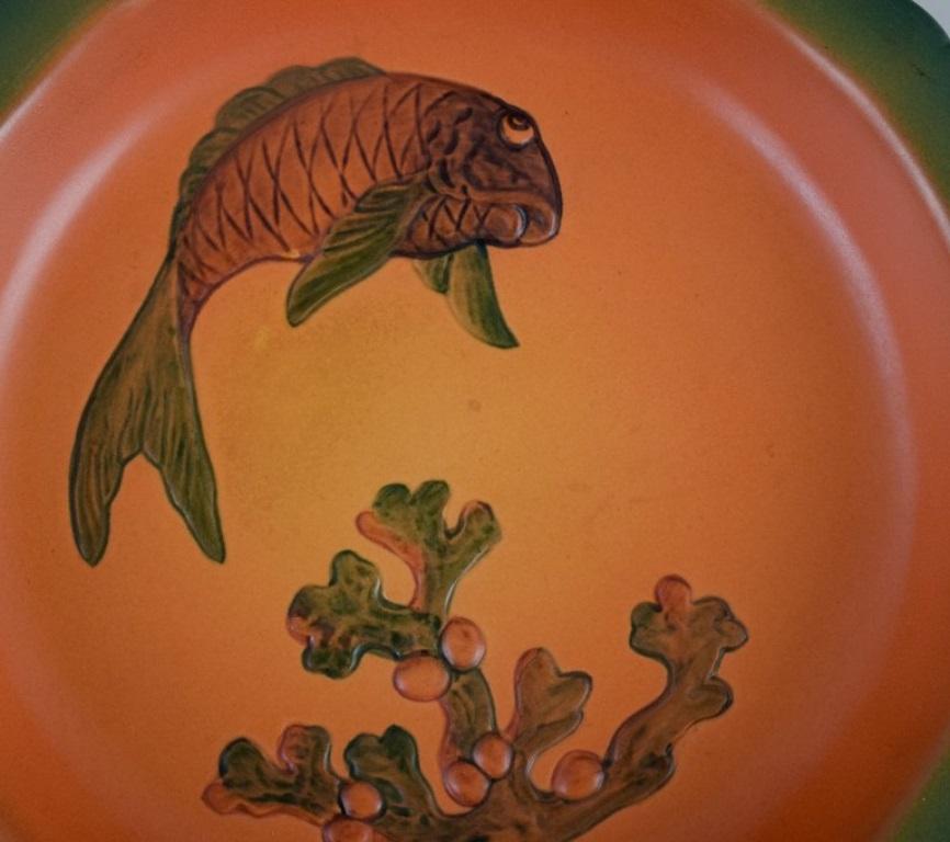 Danish Ipsens, Denmark, Dish with Fish with Glaze in Orange-Green Shades For Sale