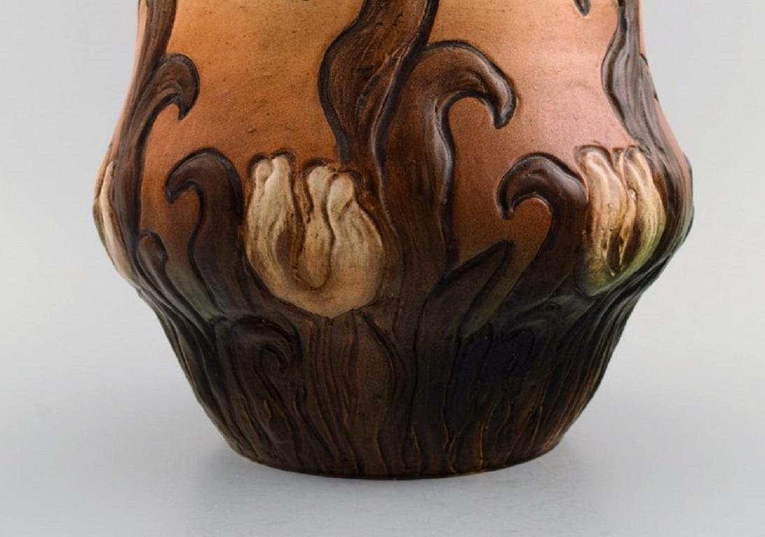 Glazed Ipsen's, Denmark. Large and rare Art Nouveau flowerpot in hand-painted ceramics For Sale
