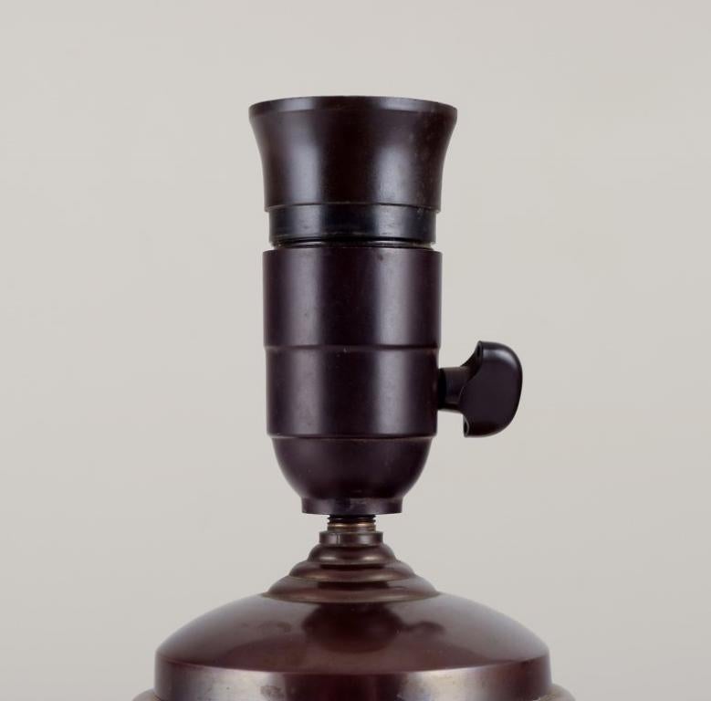 Danish Ipsens, Denmark. Large table lamp in ceramic with a motif of peacocks For Sale