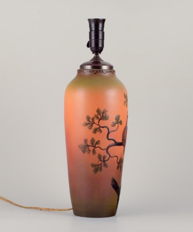 Ipsens, Denmark. Large table lamp in ceramic with a motif of peacocks In Excellent Condition For Sale In Copenhagen, DK