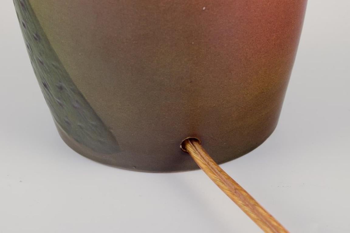 Ceramic Ipsens, Denmark. Large table lamp in ceramic with a motif of peacocks For Sale