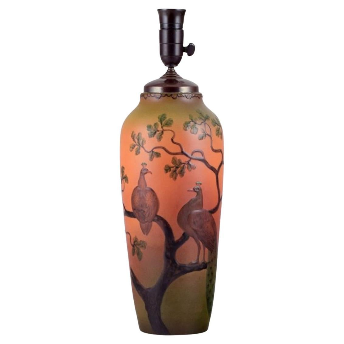 Ipsens, Denmark. Large table lamp in ceramic with a motif of peacocks For Sale