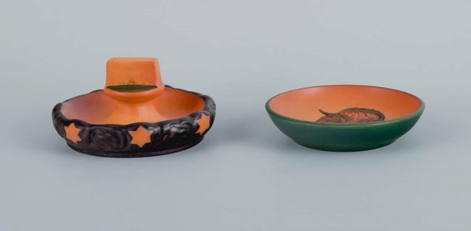 Ipsen's, Denmark. Two small bowls with glaze in orange-green shades.
Model numbers 235 and 275.
1920s-1930s.
In excellent condition.
Marked.
Tallest bowl measures: D 10.5 x H 5.5 cm.