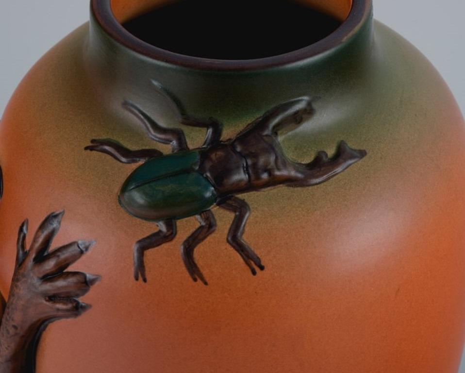 Glazed Ipsens, Denmark. Vase in glazed ceramic with lizard and beetle. For Sale