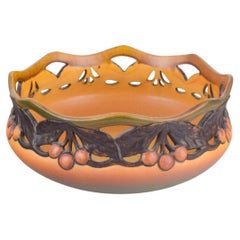Ipsens Enke. Ceramic bowl with openwork rim and relief of fruits. 1920s/30s