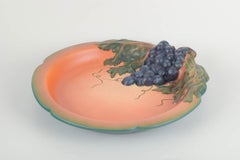 Ipsens Enke, Denmark. Ceramic dish with grape motif, ca. 1920s/30s.