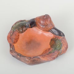 Ipsens Enke, Denmark. Decorative ceramic bowl with snail, 1920s