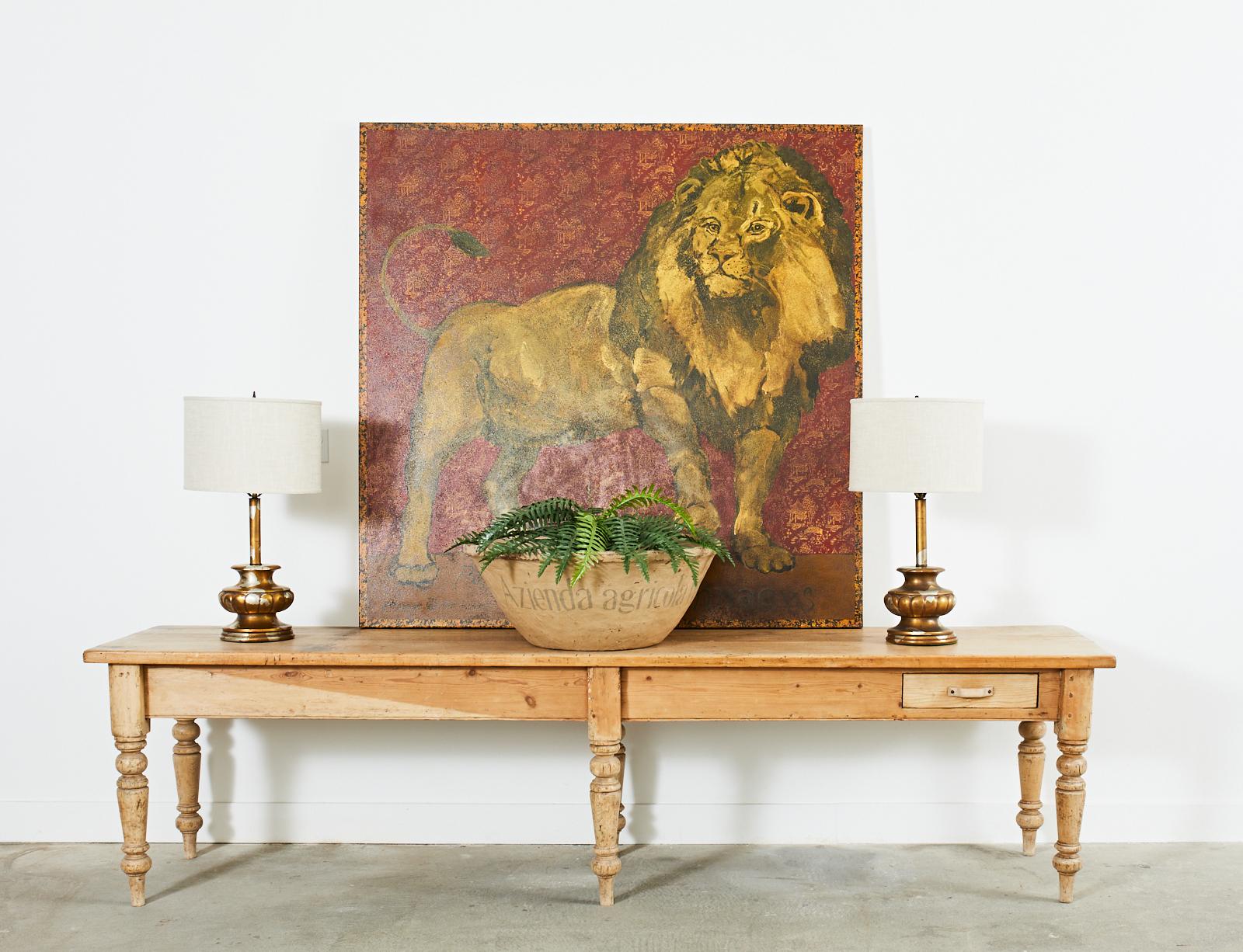 Fantastic large oil on canvas painting by Ira Yeager (American 1938-2022) Pantera Leo depicts an imposing lion in front of an Asian motif chinoiserie decorated background. The ground features intricate gilt pagodas and golden pavilions over a
