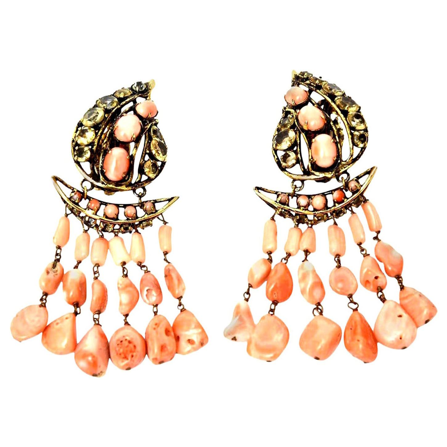 This stunning pair of signed vintage Iradj Moini Coral, Citrine and Rhinestone clip on dangle earrings are beyond fabulous. The brass is gilded to look old. There are 6 strands of  angel coral on each earring. it is old world meets modern. They have