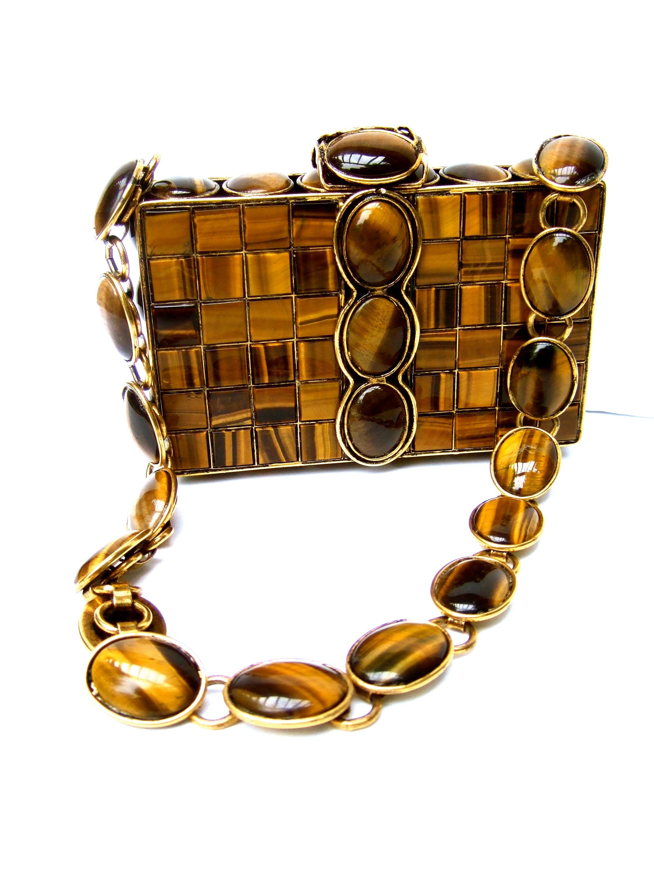 IRADJ MOINI Exquisite handmade artisan semi-precious tiger eye evening bag 
The opulent shoulder bag is embellished with rows of handset square tiger eye tiles
on the front & back exterior panels 

Juxtaposed with a band of larger oval shaped