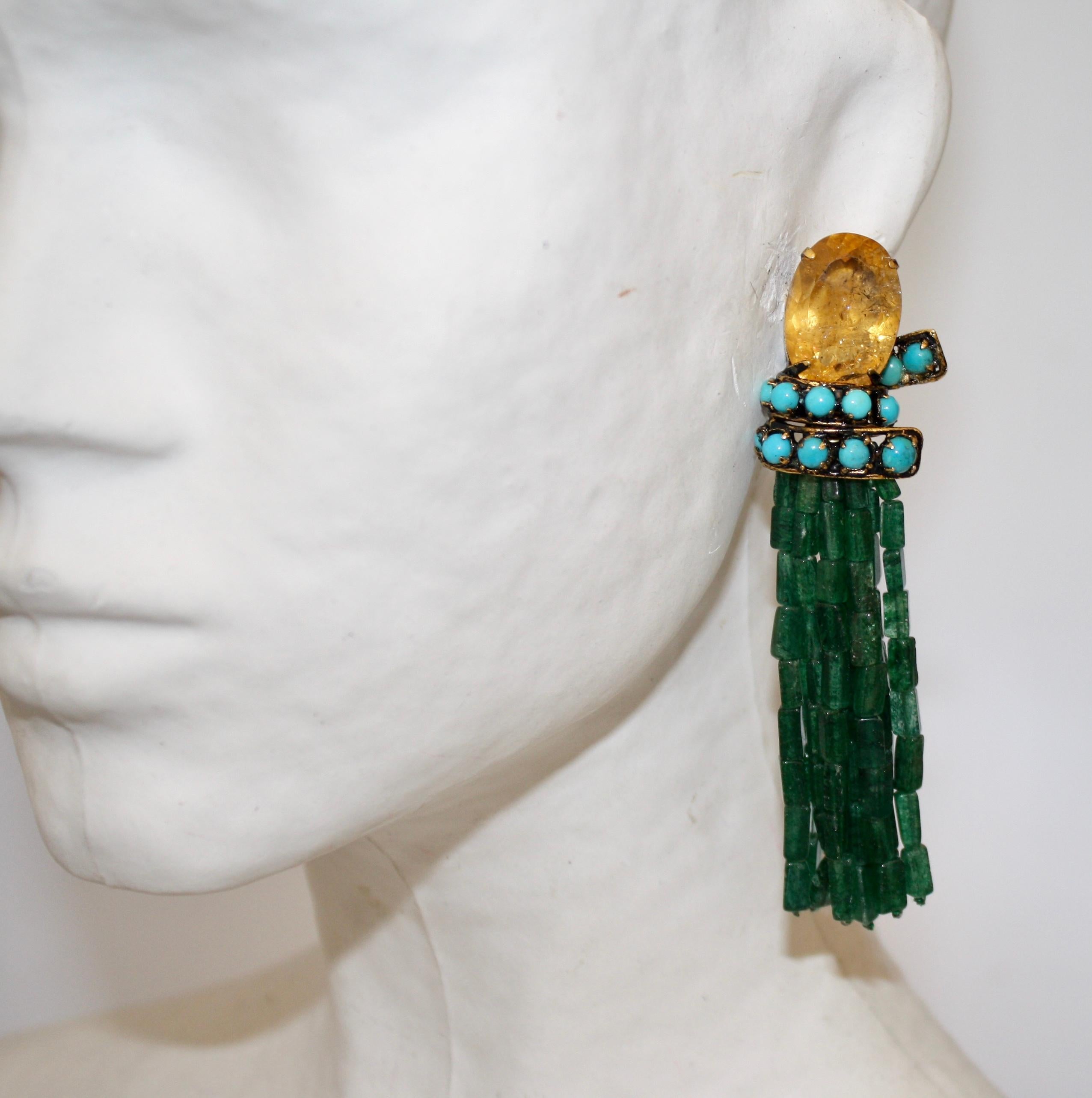 Gorgeous tassel clip earrings from Iradj Moini made with strands of aventurine and a lemon quartz and turquoise clip top. 