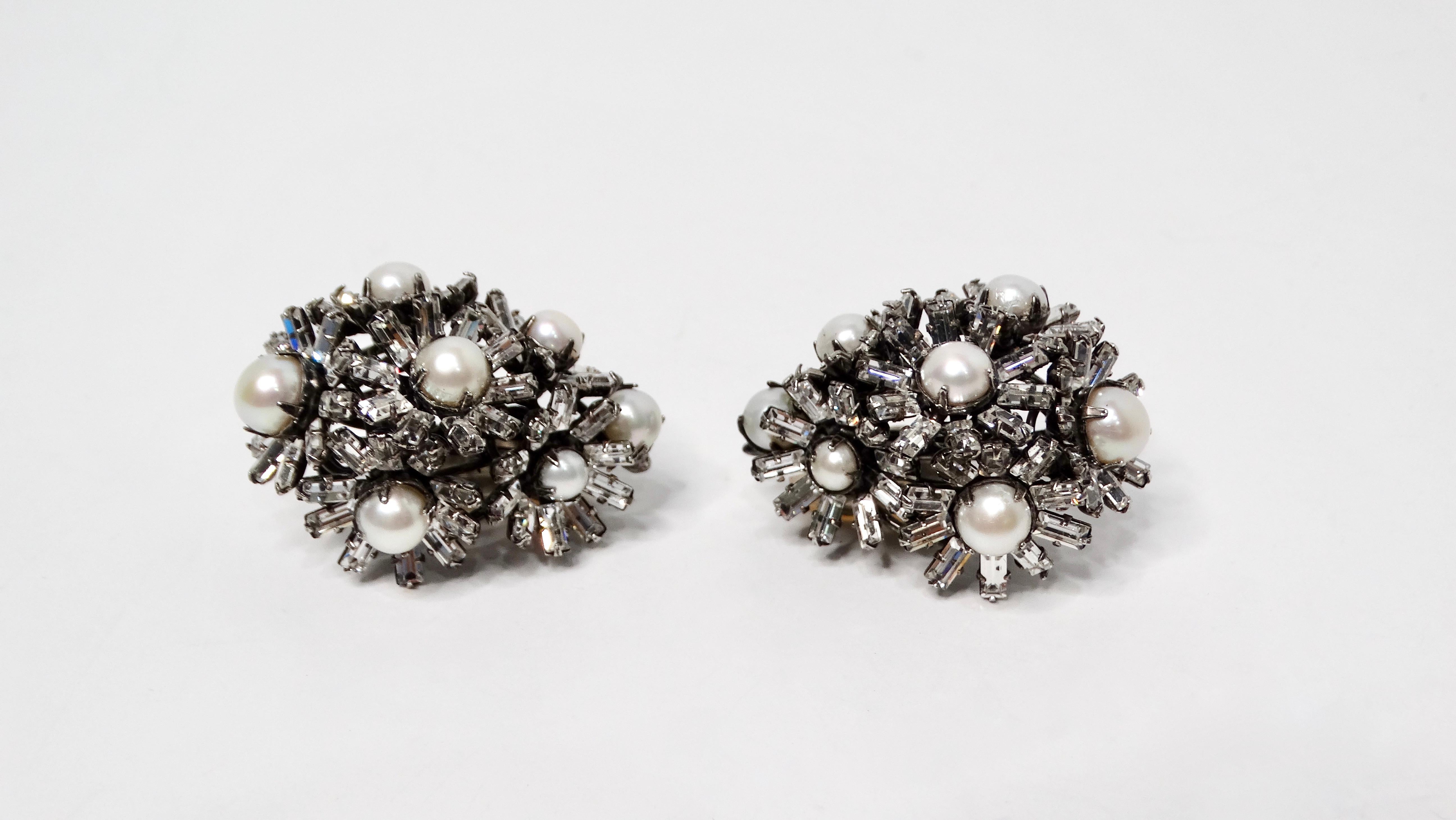 The Iradj Moini Multi Flower Pearl & Swarovski Crystal Clip-On Earrings are a breathtaking example of artisanal craftsmanship, handmade in Manhattan with meticulous attention to detail. Constructed on an 18k gold-plated brass base, these earrings