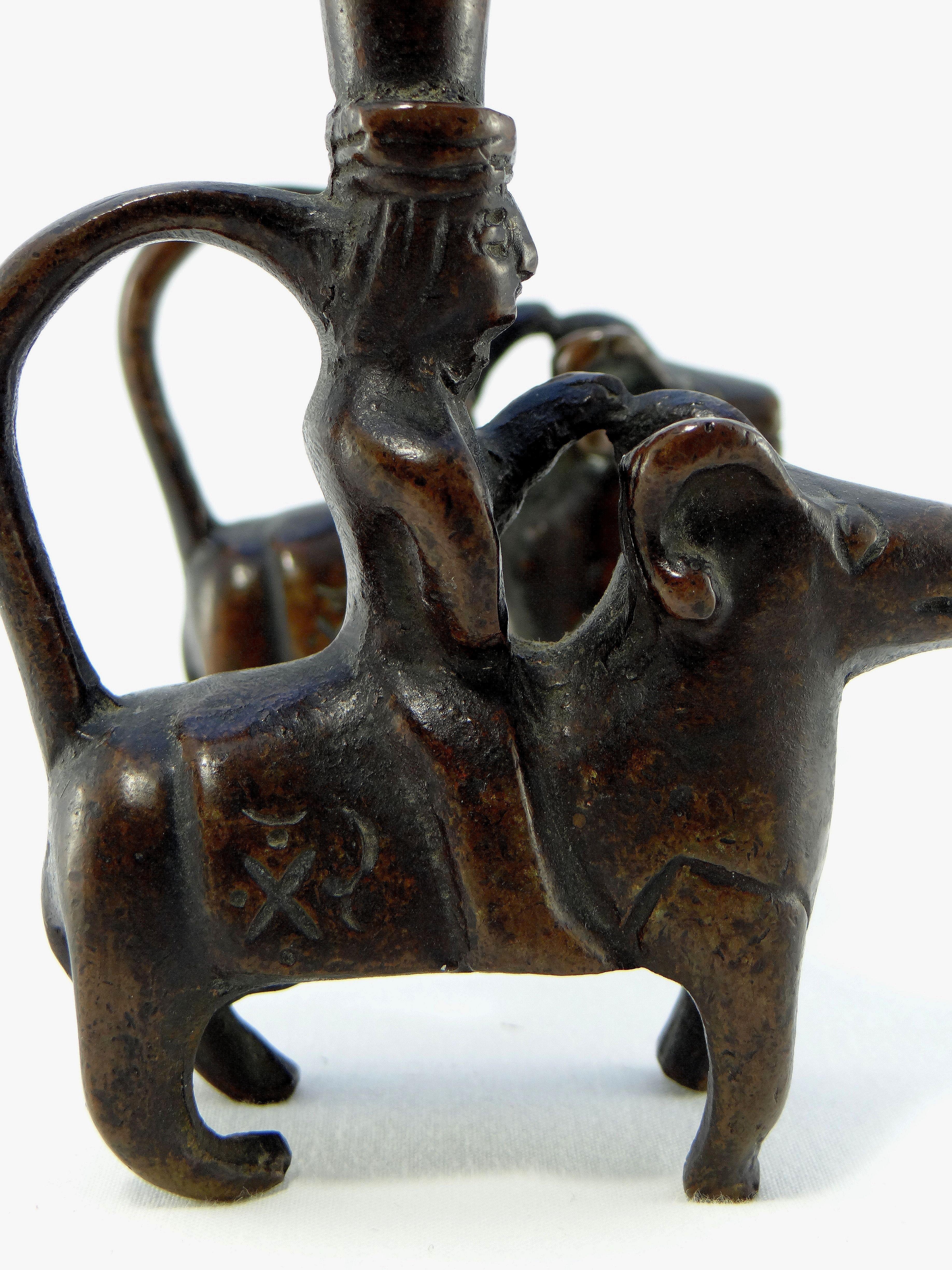 Iran 18th-19th Century, Pair of Bronze Candlesticks Characters on Rams For Sale 5