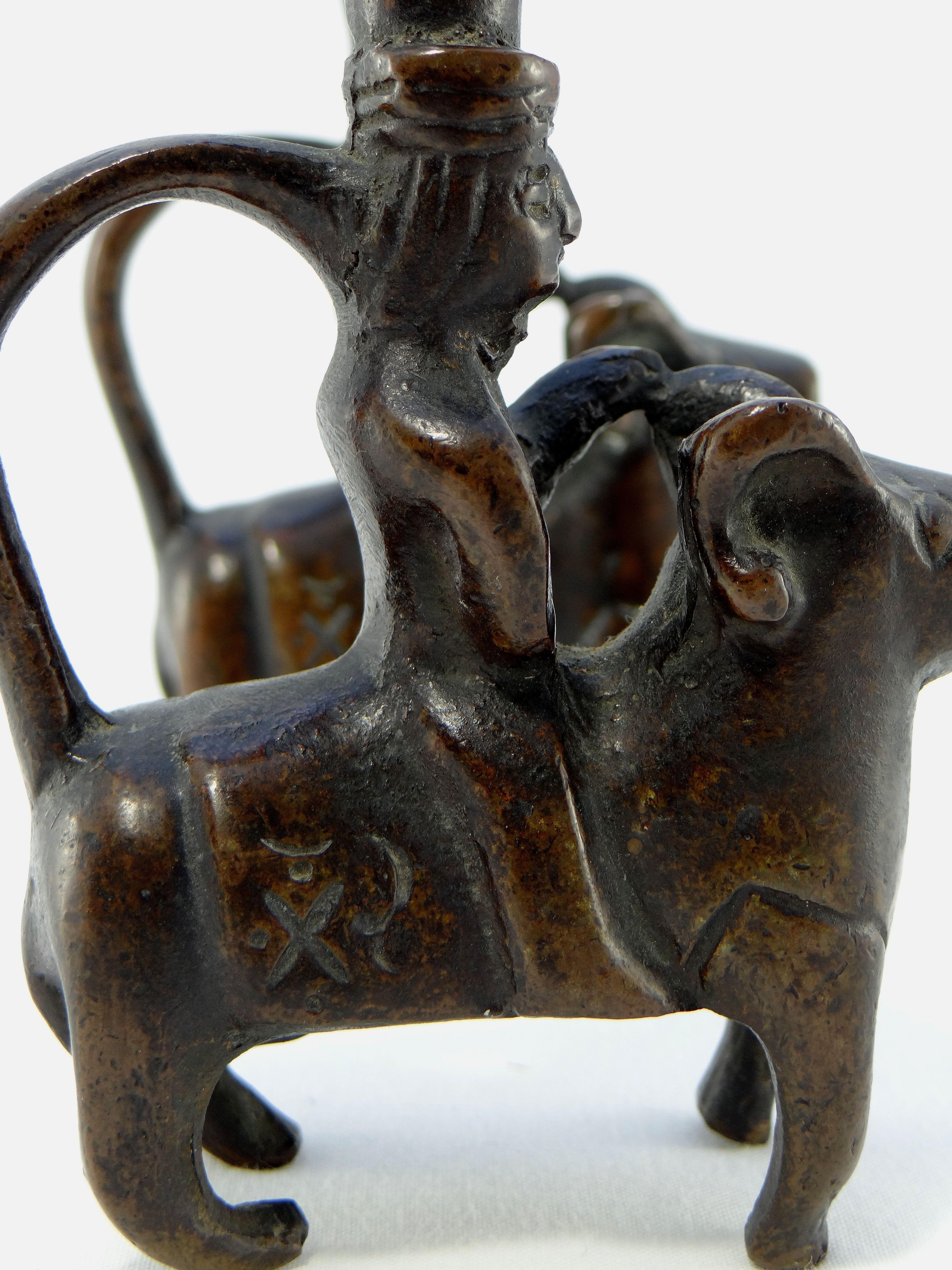 Iran 18th-19th Century, Pair of Bronze Candlesticks Characters on Rams For Sale 6