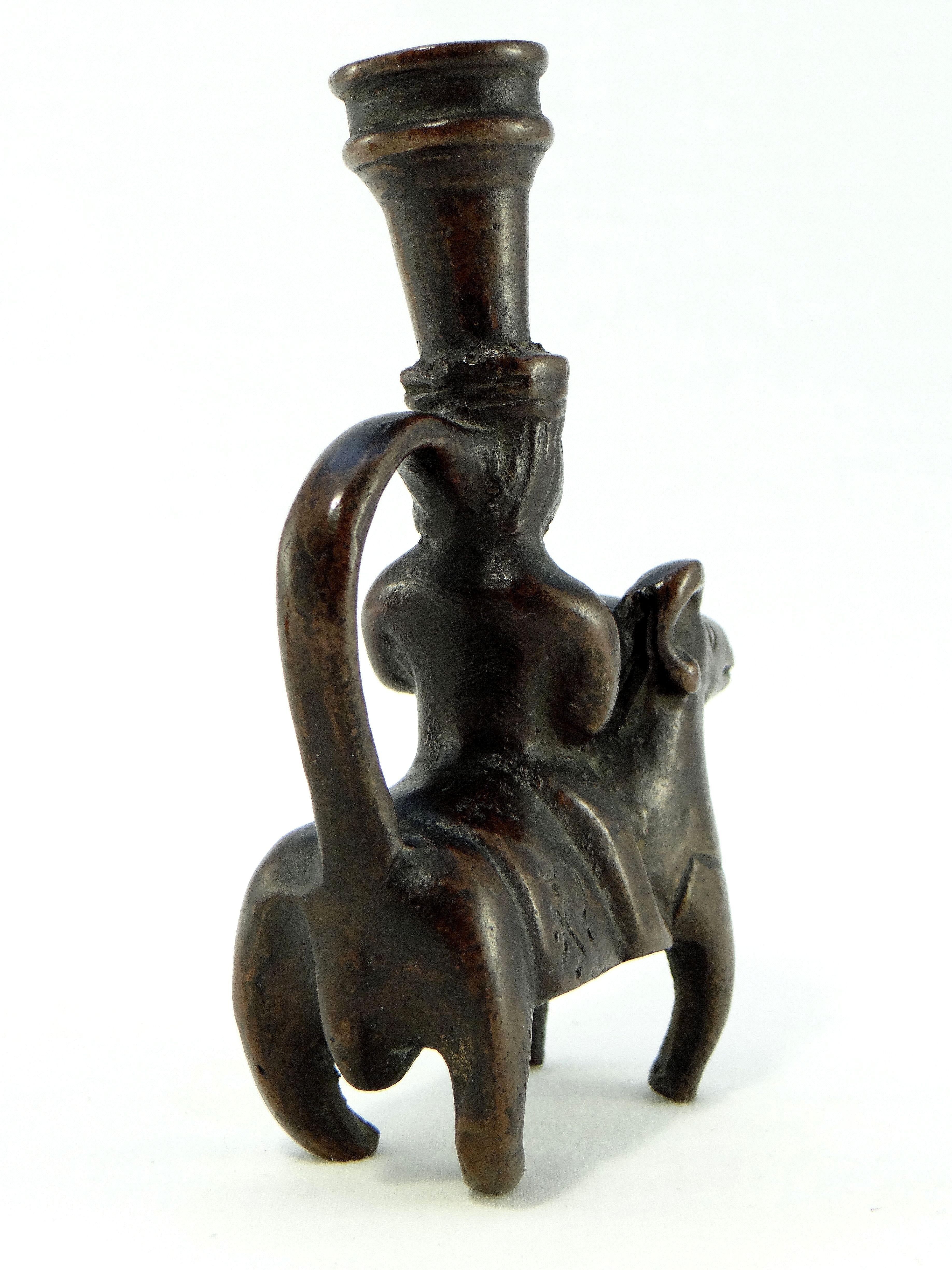 Late 18th Century Iran 18th-19th Century, Pair of Bronze Candlesticks Characters on Rams For Sale