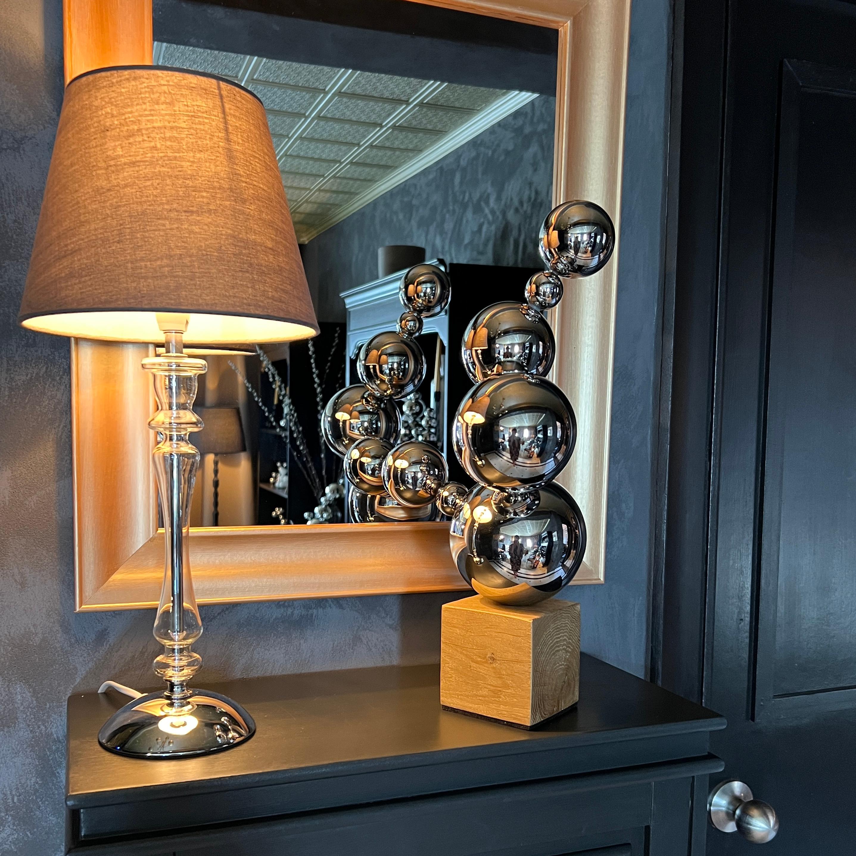 Made in Spain, 2023.

Pure symbolism and collaboration of steel and nature wood (French oak) make this series of sculptures ideal for table or floor-pedestal installation in the office, bedroom, cabinet, reception, or hall.

Location and Delivery