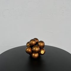 Used Dark brown round flower sculpture