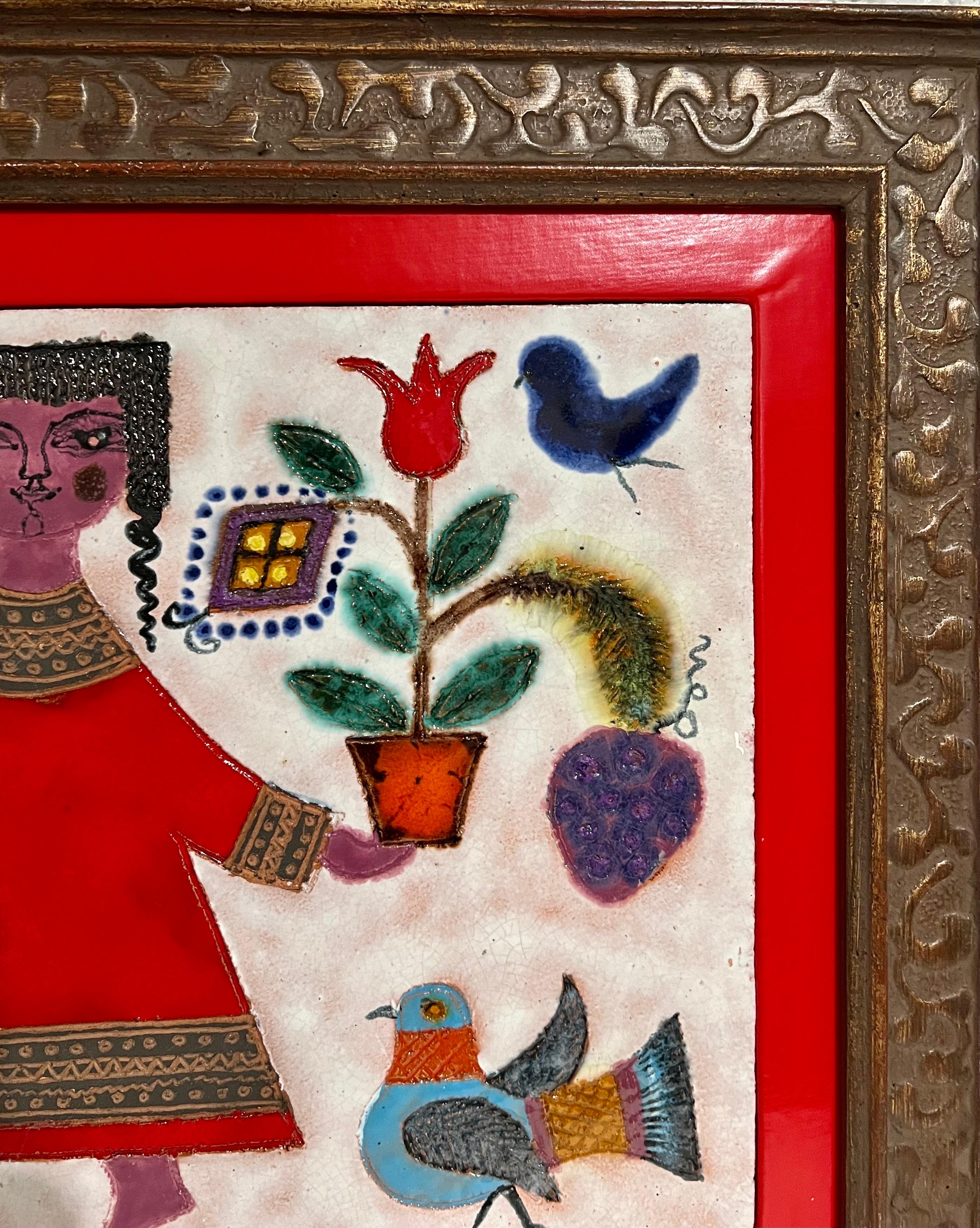 This is a rare ceramic plaque painted with enamel glaze by famed Israeli German artist Irene Awret (these are generally hand signed Awret Safed on the verso. I just have not opened the frame to check)  the actual glazed ceramic is 10.25 X 14.75