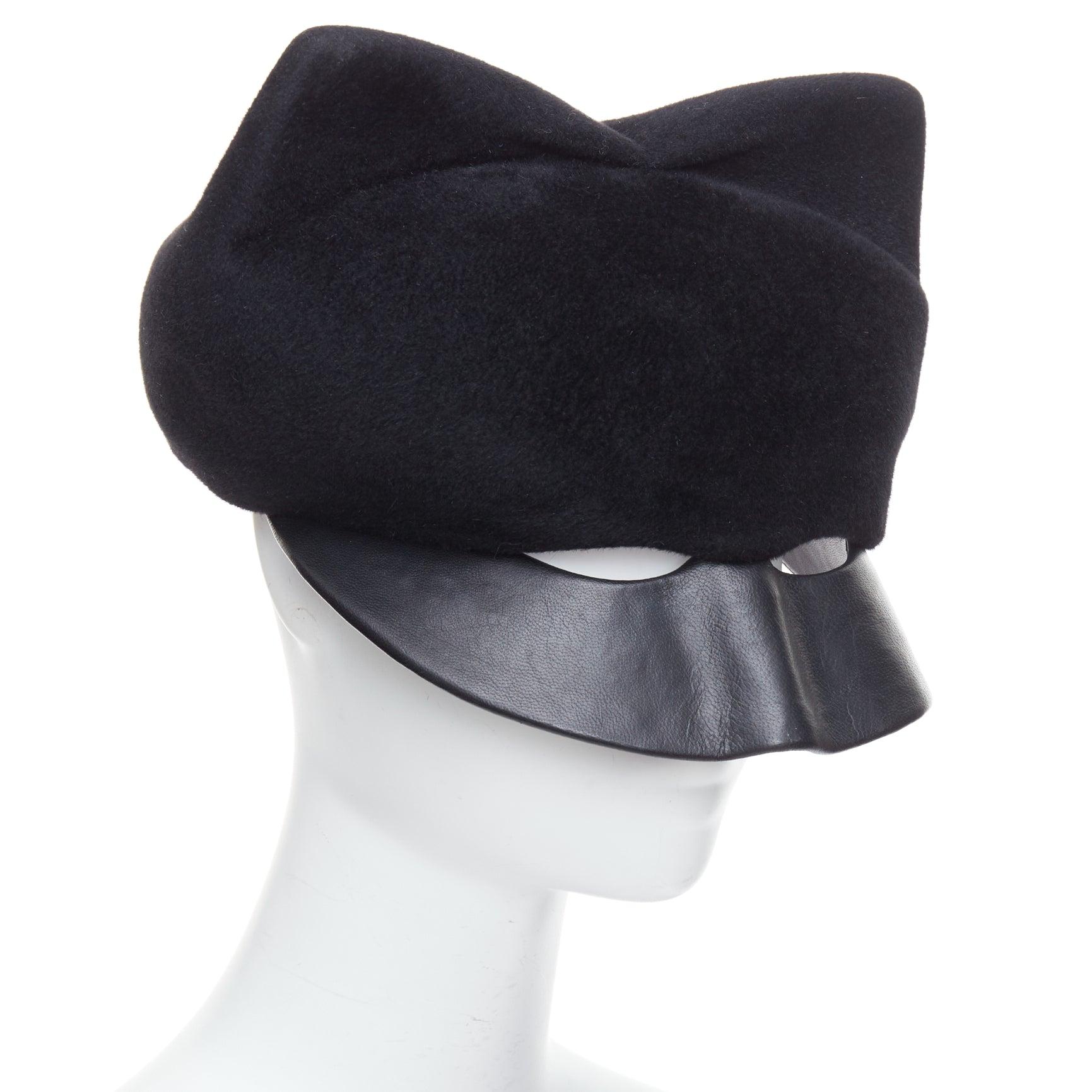 Irene noir laine cat eye découpé chapeau fascinateur de mascarade.
Référence : NKLL/A00376
Marque : Irene
MATERIAL : Semblable à de la laine, cuir
Couleur : Noir
Motif : Solide
Fermeture : Slip On
Doublure : Tissu noir

CONDITION :
Condition : Très