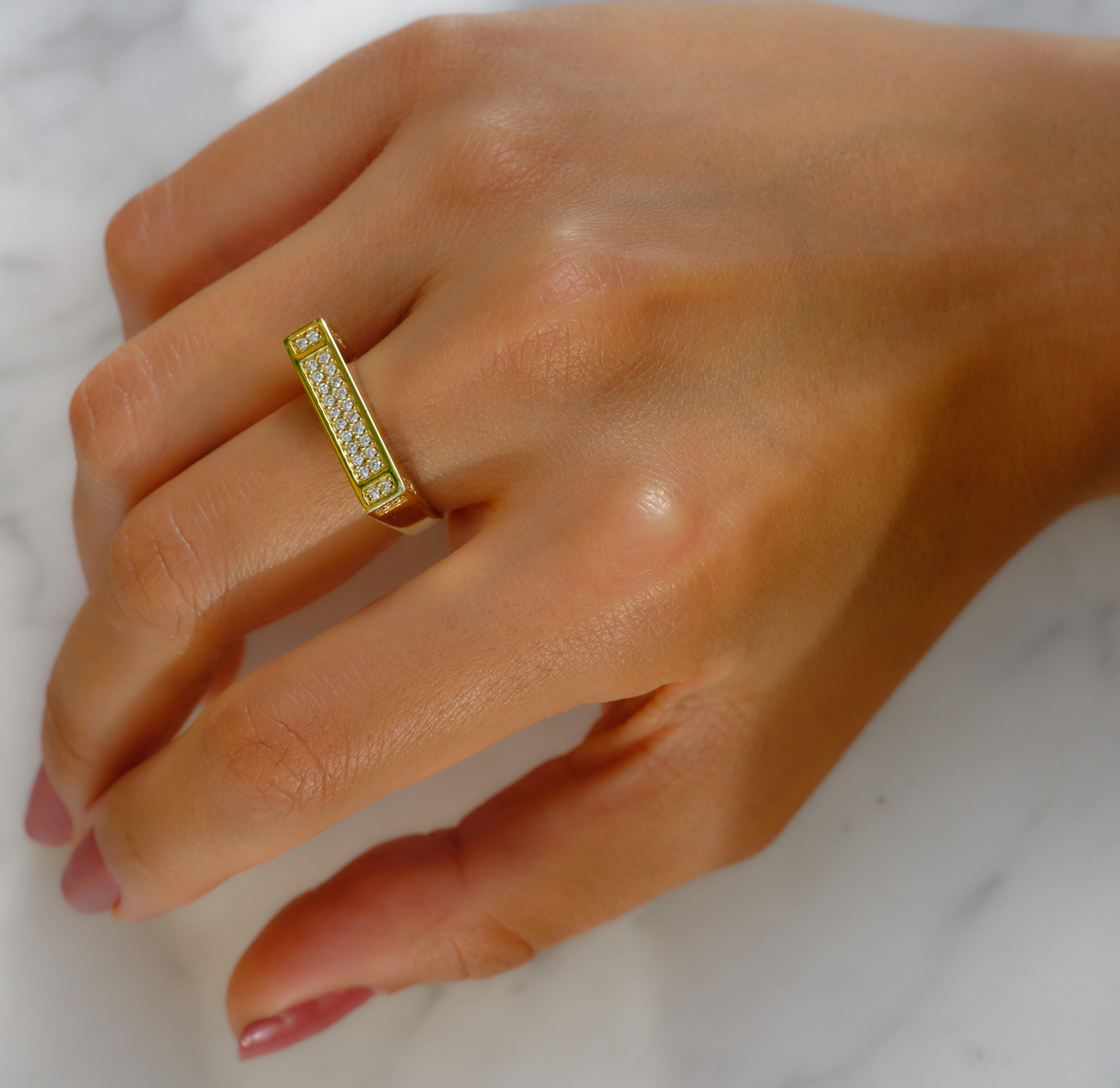 Feel the elegant lines of this comfy diamond ring in Art déco style.

Available yellow gold in size 55 (EU), 7,5 (US), 17,5mm
The size can be altered to fit

•	18 Karat Recycled Yellow Gold 
•	Weight: approx. 6 gr gold
•	Width: 5 mm
•	36 brilliants