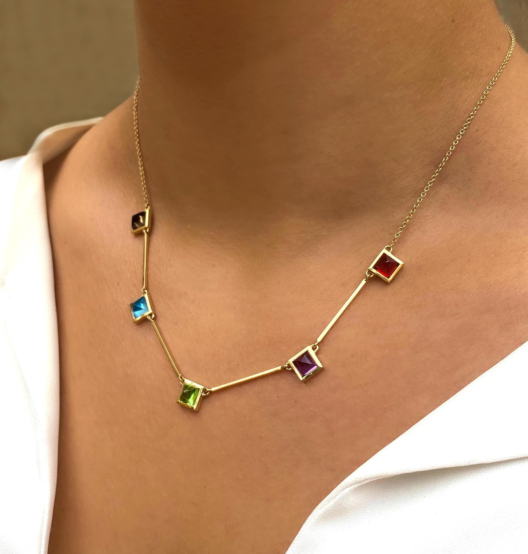 You can combine the gems or choose our combination of Garnet,  Amethyst , Peridot, Blue Topaz  and Smoky Quartz.

Benben collection is inspired by the myths and the geometry of this pyramid. The Benben stone, named after the mound, was a sacred