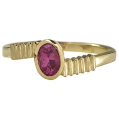 18 Karat Yellow Gold with 0.50 Carat Pink Sapphire in Oval Cut Stacking Ring