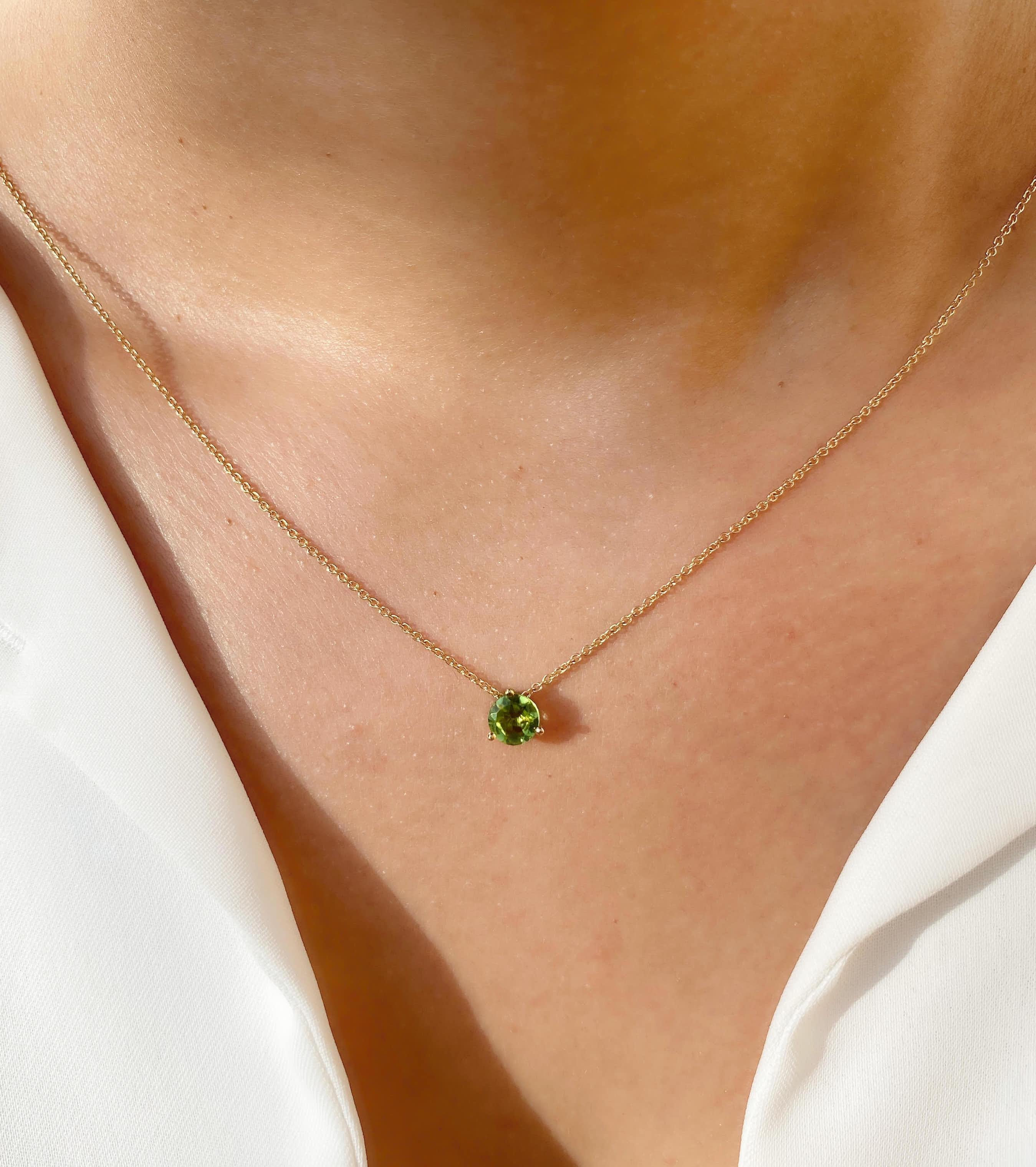•	18 Karat Recycled Yellow Gold 
•	42 cm chain with extension
•	Available color: Yellow Gold
•	Peridot 6mm round cut
•	Origin: Caparaó mine, Brazil
•	Hand-made in Spain
•	Match with Round Peridot Earrings & Marquise Peridot Necklace

Irene Bozza,