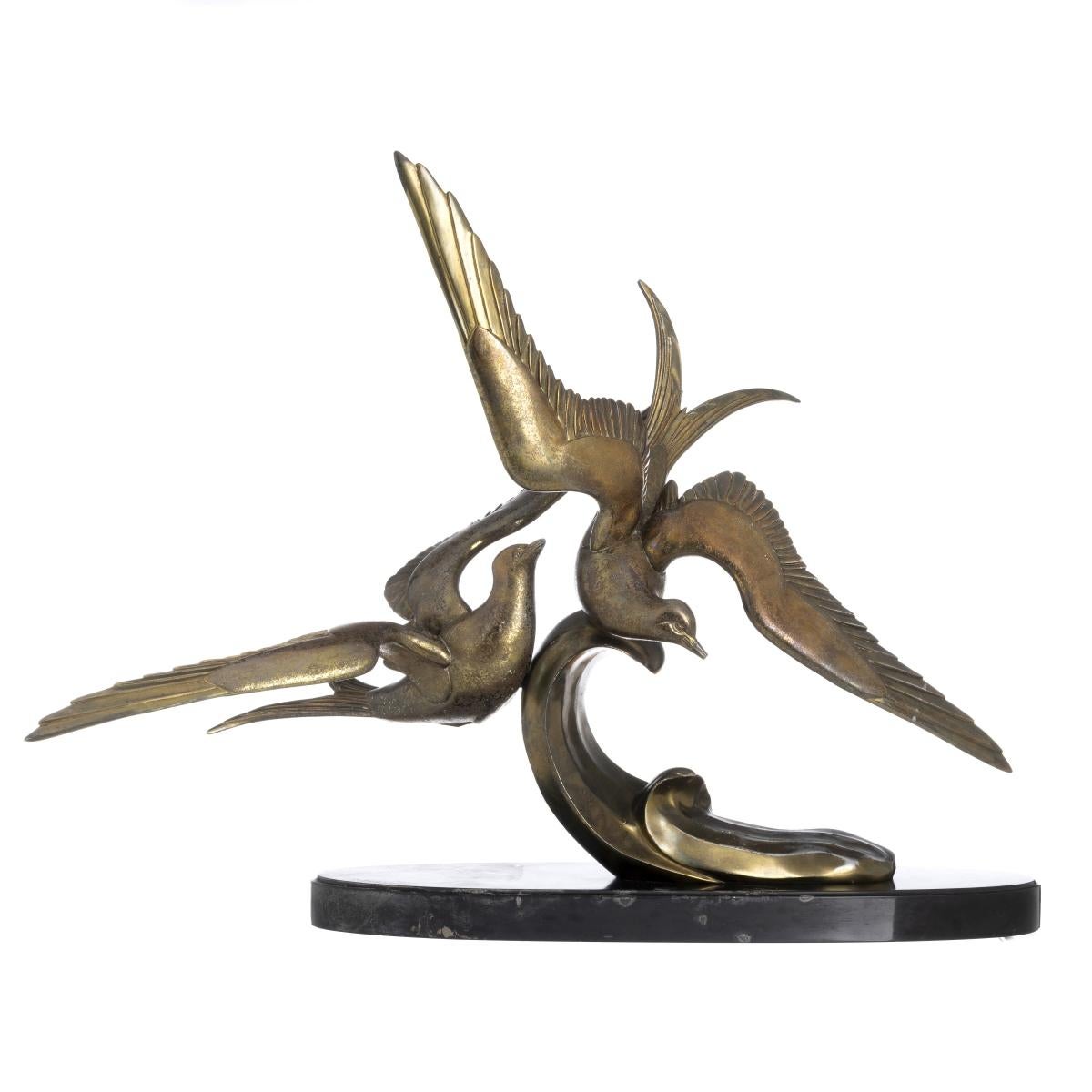 This dynamic bronze sculpture, titled “Two Seagulls in Flight”, is by French artist Irénée Rochard (1906–1984), renowned for his naturalistic representations of birds and wildlife. The work captures two seagulls soaring in graceful motion, their