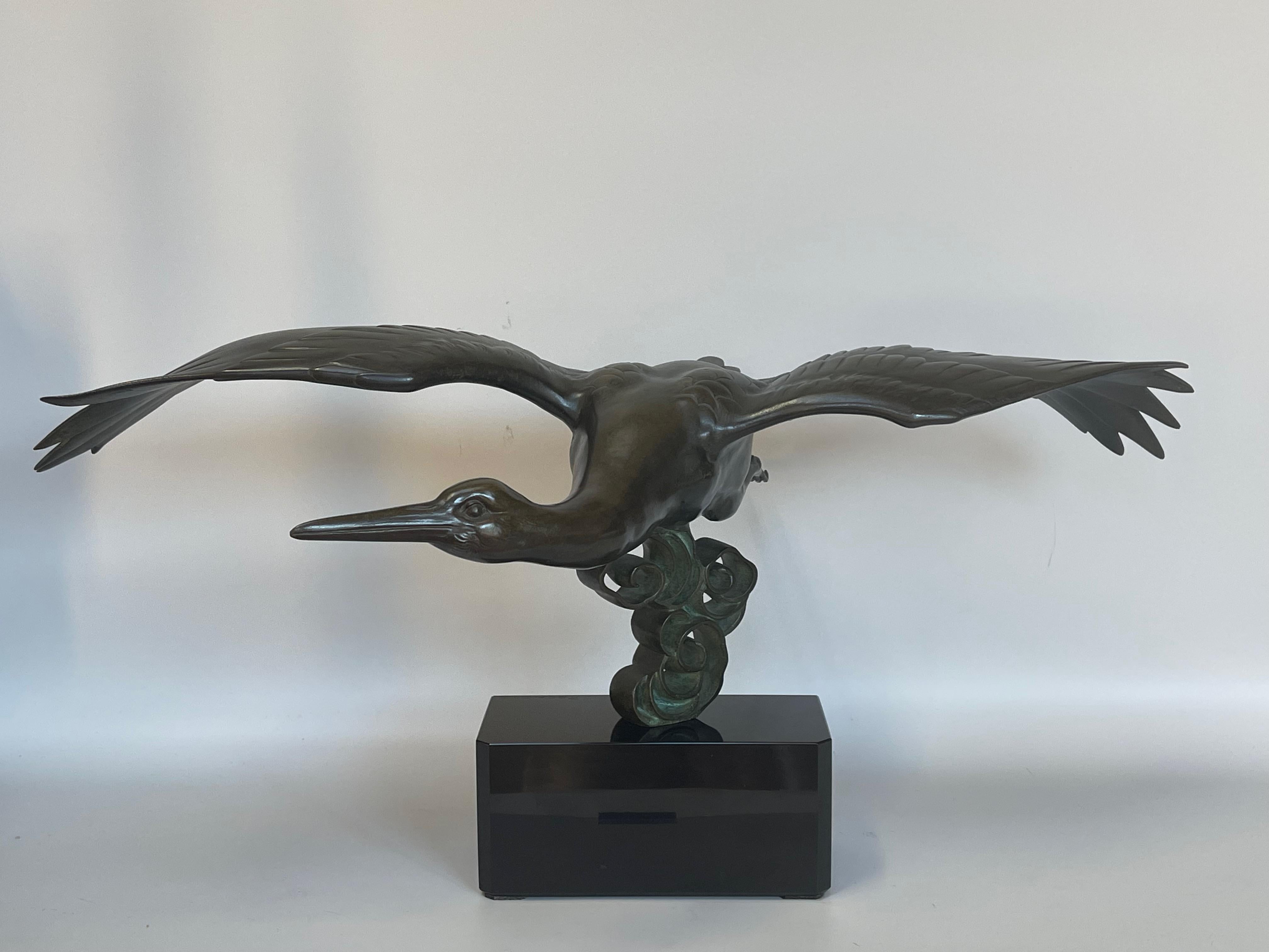 Ireneé Rochard Art Deco bronze representing the flight of a bronze stork with green patina on a black marble base.
In very good shape. Stamped I Rochard on the base.

Measures: height: 33cm
width: 66cm
depth: 40cm
Weight: 14kg

Irénée Rochard