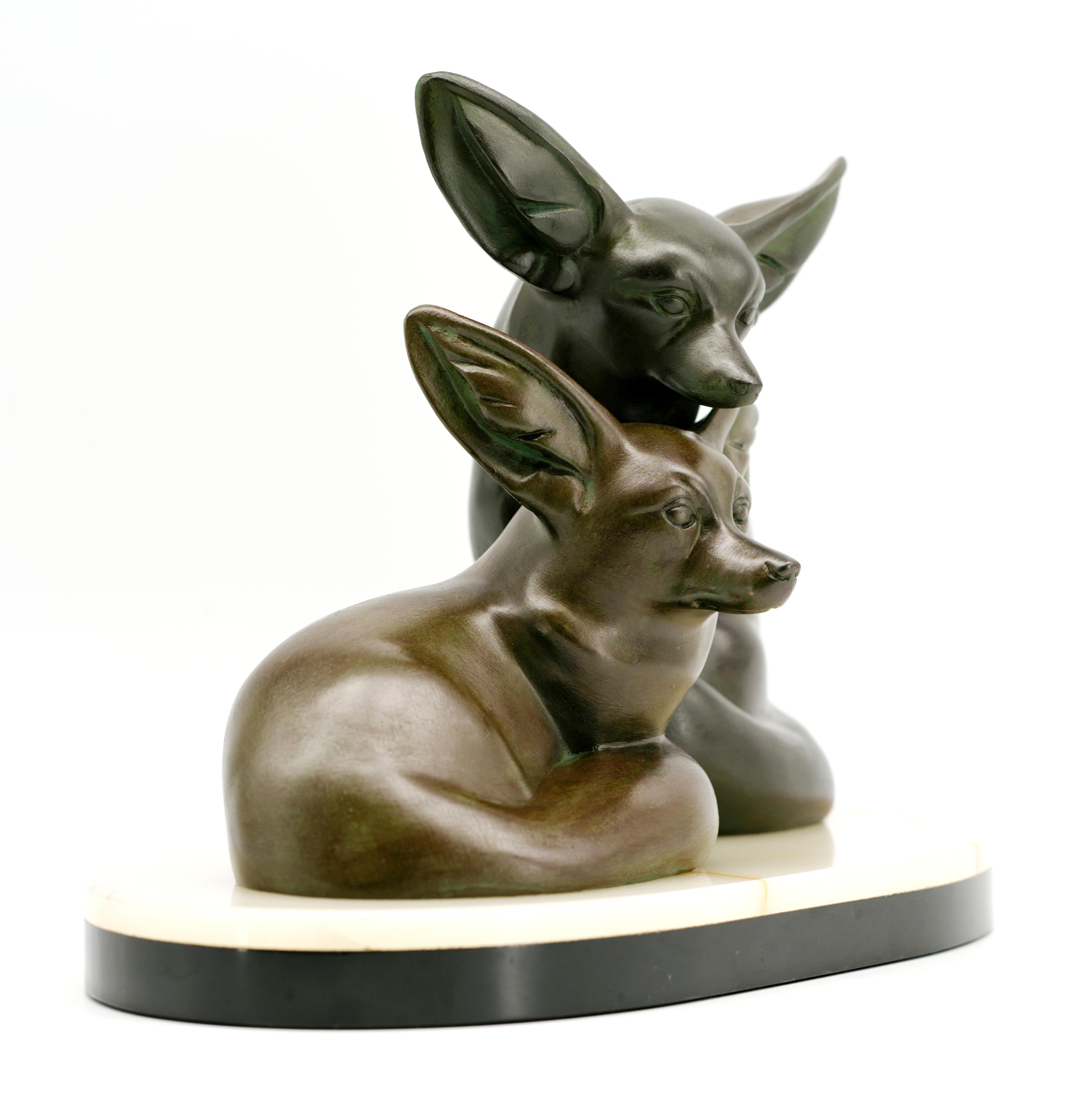 French Art Deco sculpture by Irenee Rochard, France, 1920s. Couple of fennecs. Spelter, oxyx and marble. Double patina (one for each fennec). Width : 13.6