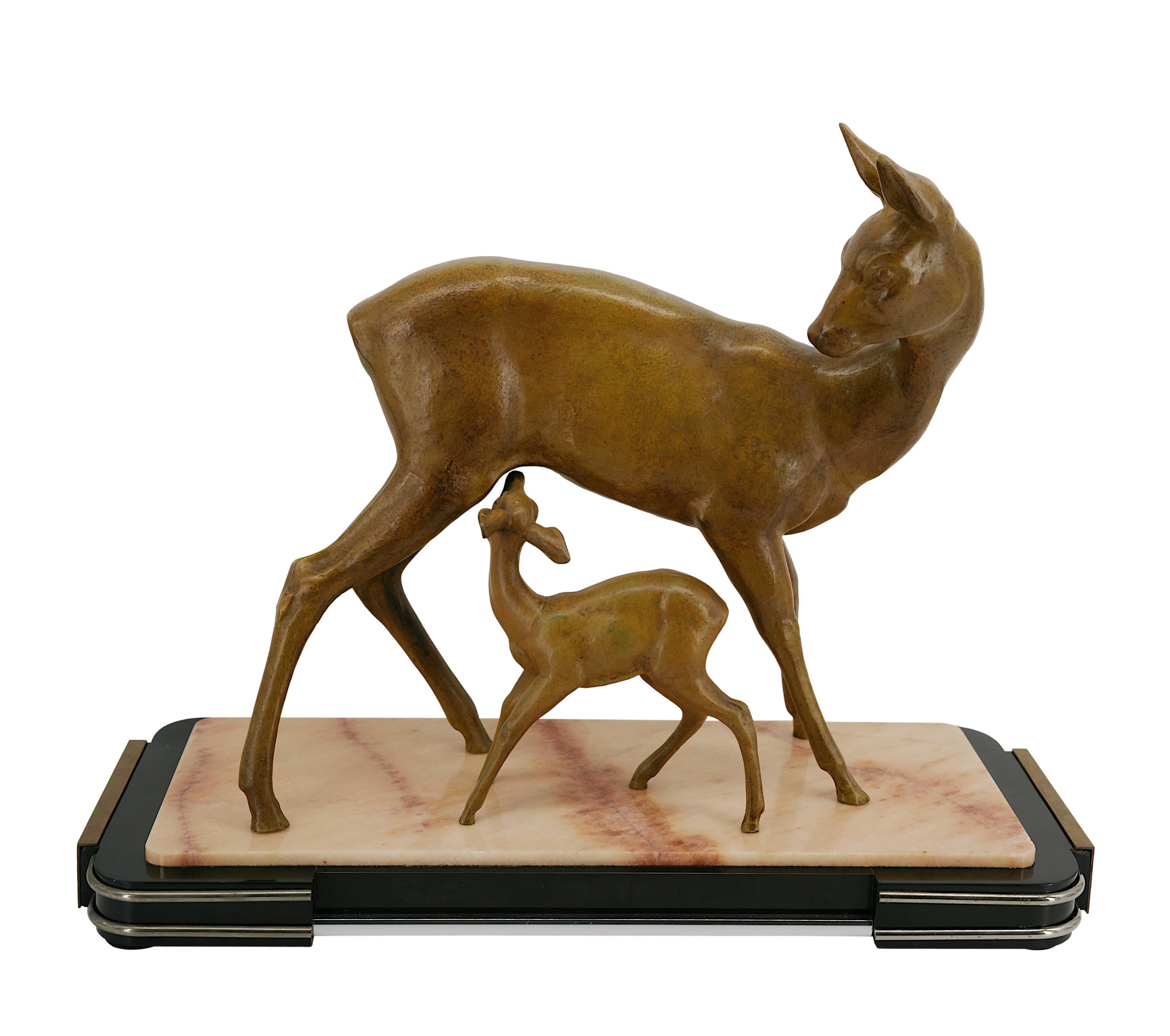 Large French Art Deco Sculpture by Irénée Rochard – Doe and Her Fawn. This exquisite Art Deco sculpture is titled “Doe and Her Fawn” . Rare in this size and model. This elegant piece is a stunning representation of nature, featuring a doe and her