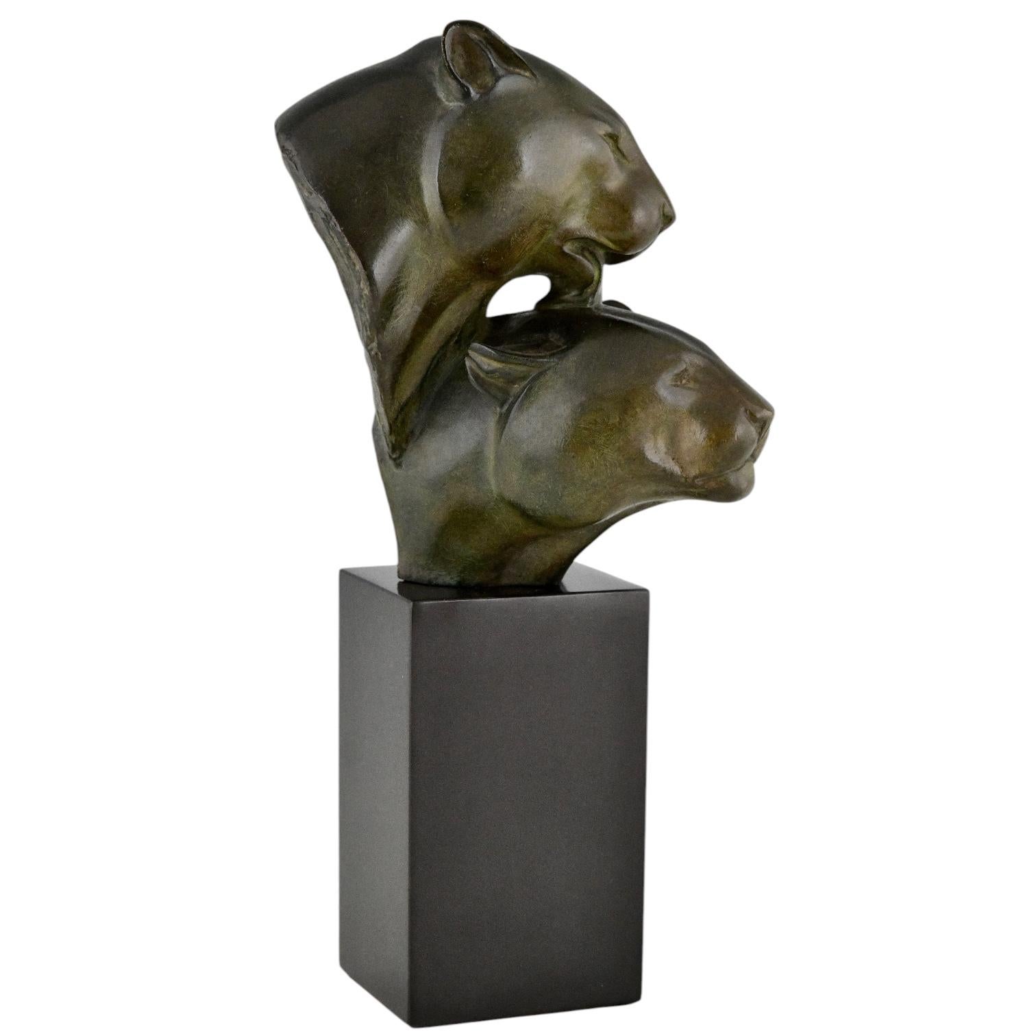 Art Deco bronze sculpture two panther heads. For Sale 1