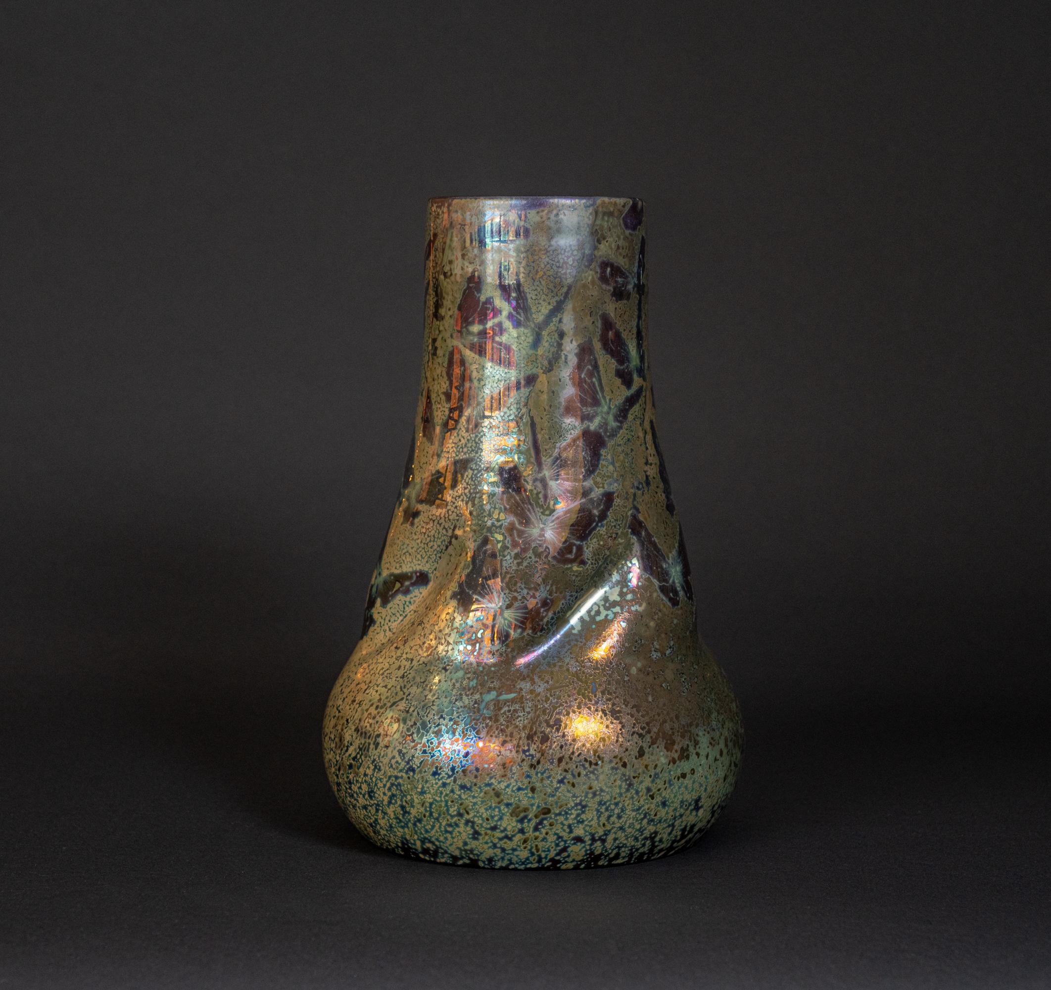 Signed Lucien Levy-Dhurmer. 

An encounter with Massier’s luster-glazed ceramics is an embarkation on an acid-colored trip, the sort of exploration which inspires deep reflection and requires transparency. Clement Massier, an accomplished ceramist