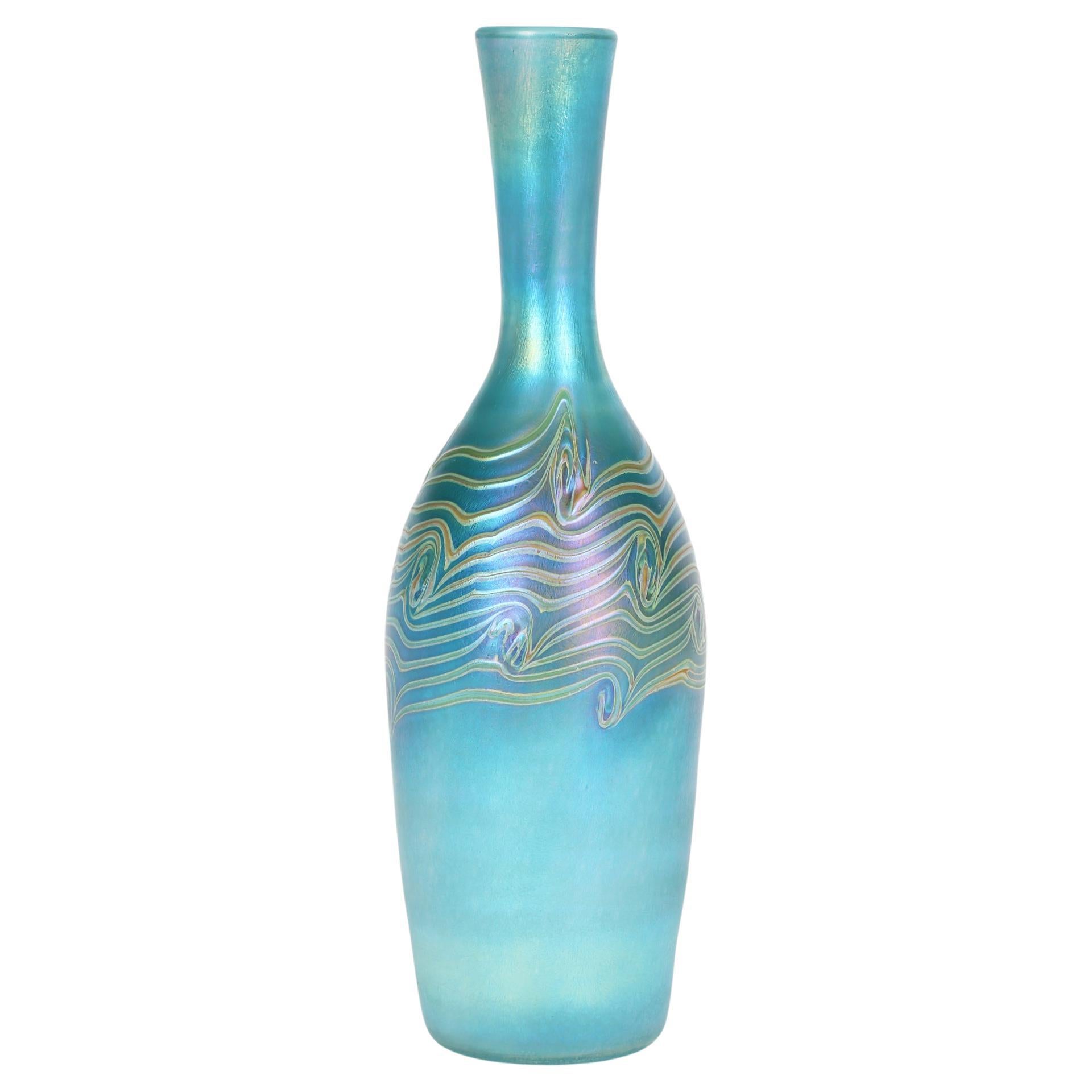 Iridescent Blue Bottle Shaped Art Glass Vase with Peacock Feather Trailing