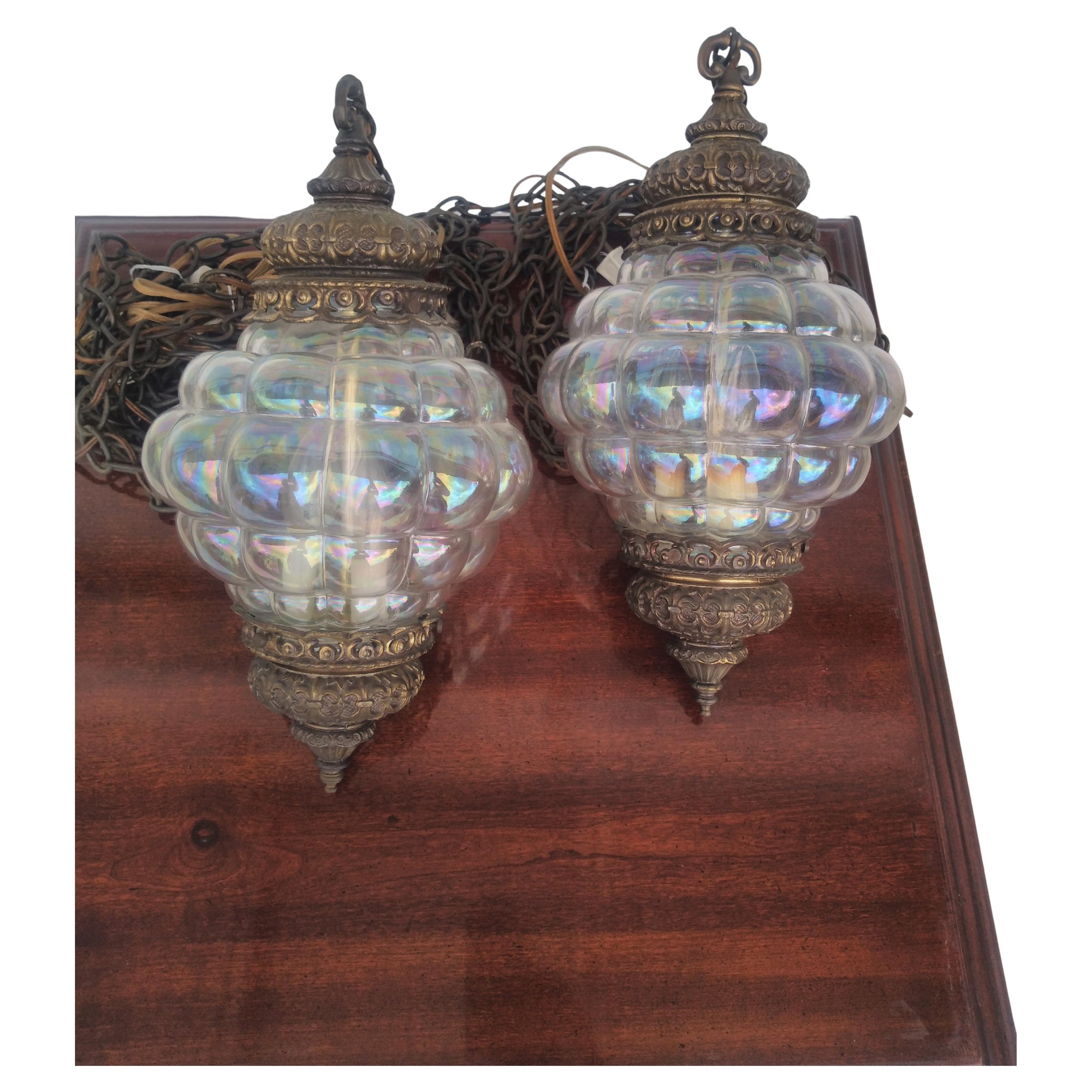 This is a plug-in swag lamp. It has a beautiful iridescent bubble glass. The lamp chains are brass.

2 lamps available.
