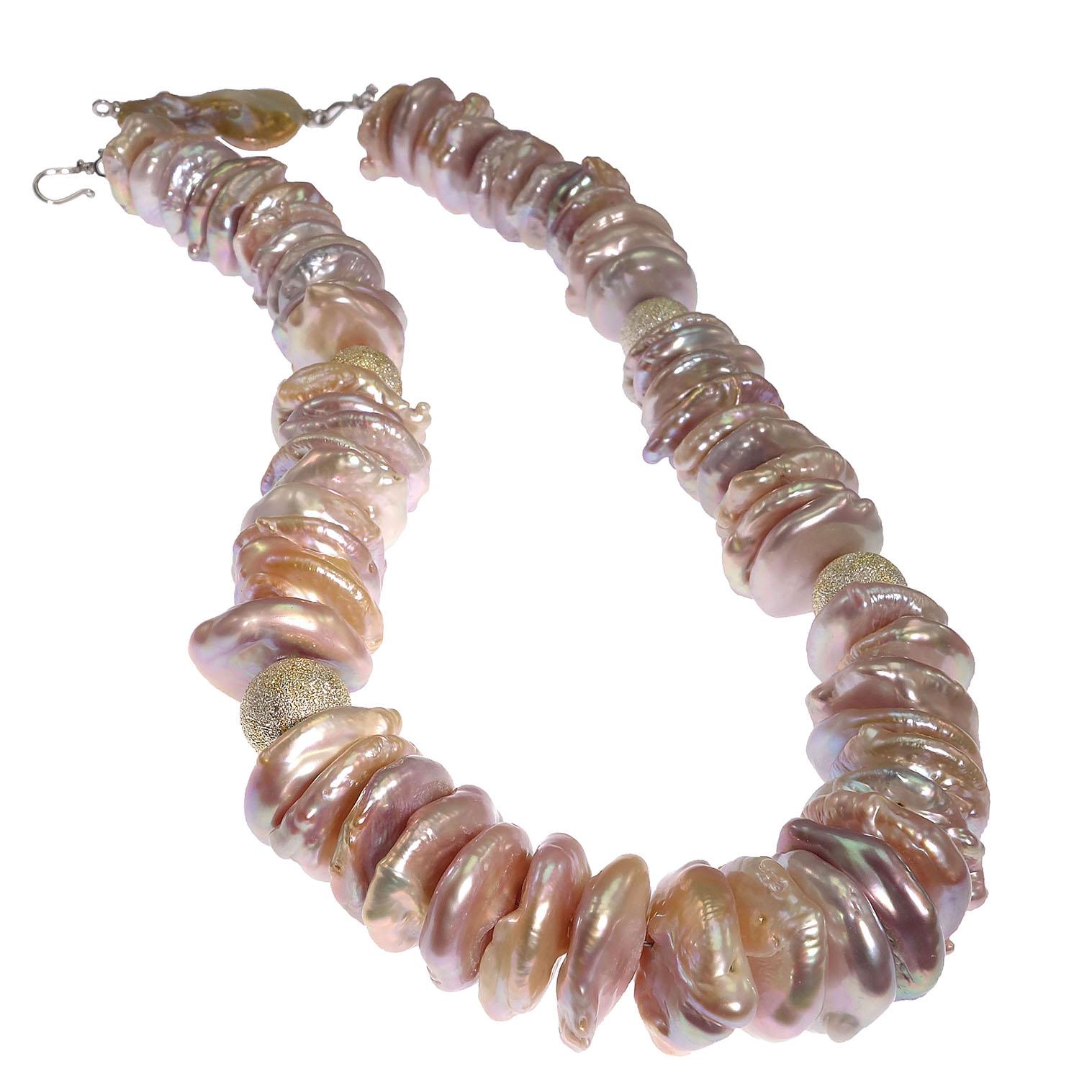 'Pearls are always appropriate' Jackie Kennedy

Custom made center drilled iridescent Coin Pearl necklace with baroque pearl clasp and sparkling gold and silver ball accents. These 18MM glowing Coin Pearls are various shades of pink, mauve, peach,